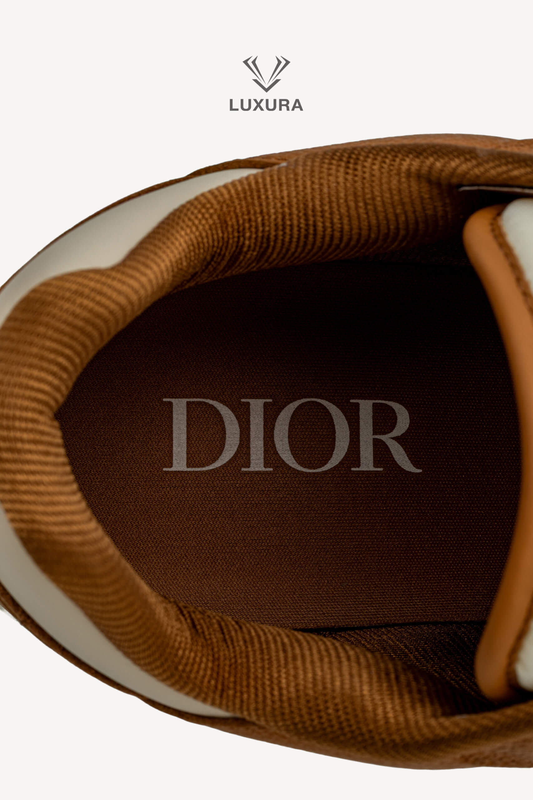<span style="font-size: 10px;letter-spacing: .15em">NEW COLLECTION</span><br>            <strong>DIOR</strong><br>            <div style="margin-top:10px;font-size:16px">B27 Uptown Low-Top Sneaker Cognac and White with White Dior Gravity Leather 44 </div><br> - Image 18