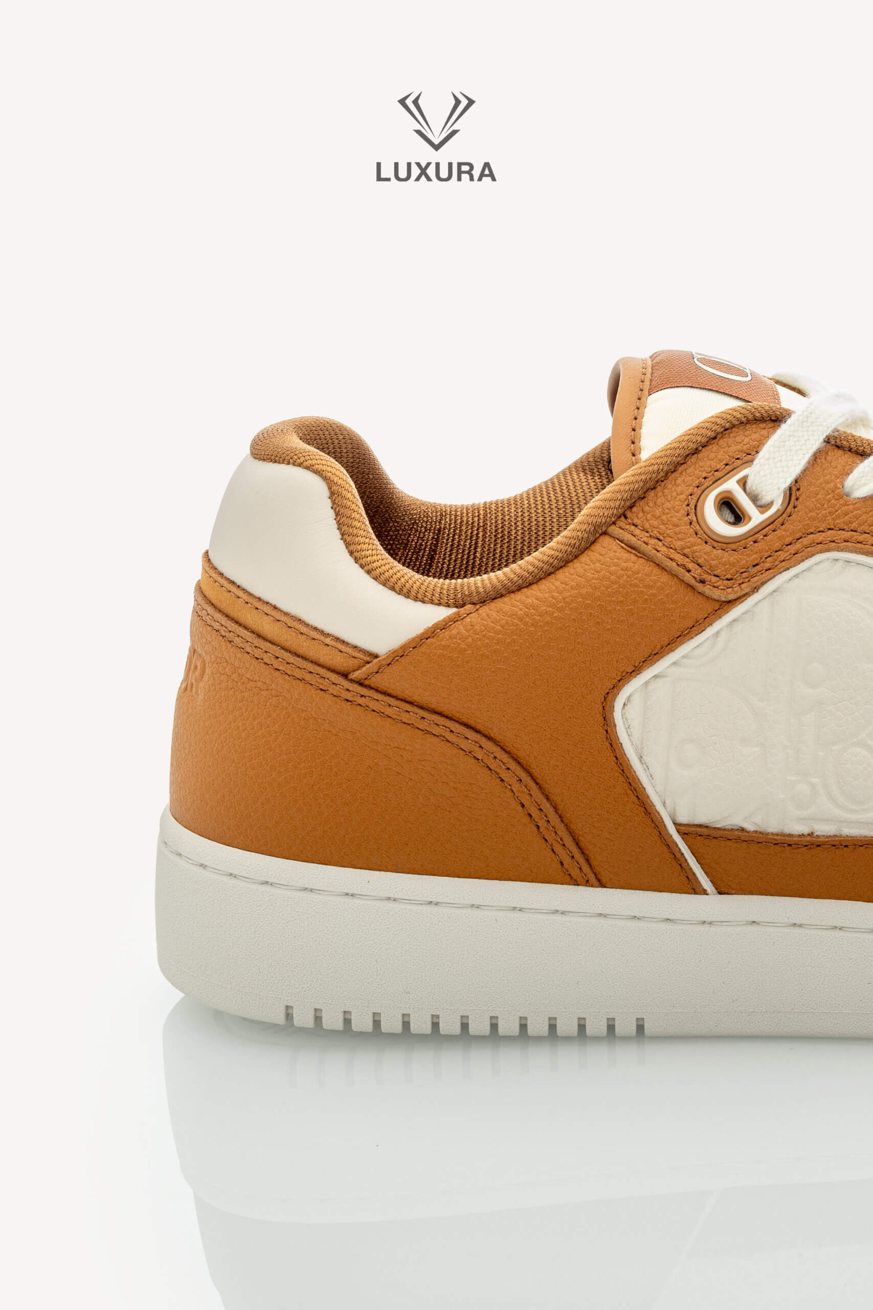 <span style="font-size: 10px;letter-spacing: .15em">NEW COLLECTION</span><br>            <strong>DIOR</strong><br>            <div style="margin-top:10px;font-size:16px">B27 Uptown Low-Top Sneaker Cognac and White with White Dior Gravity Leather 44 </div><br> - Image 8