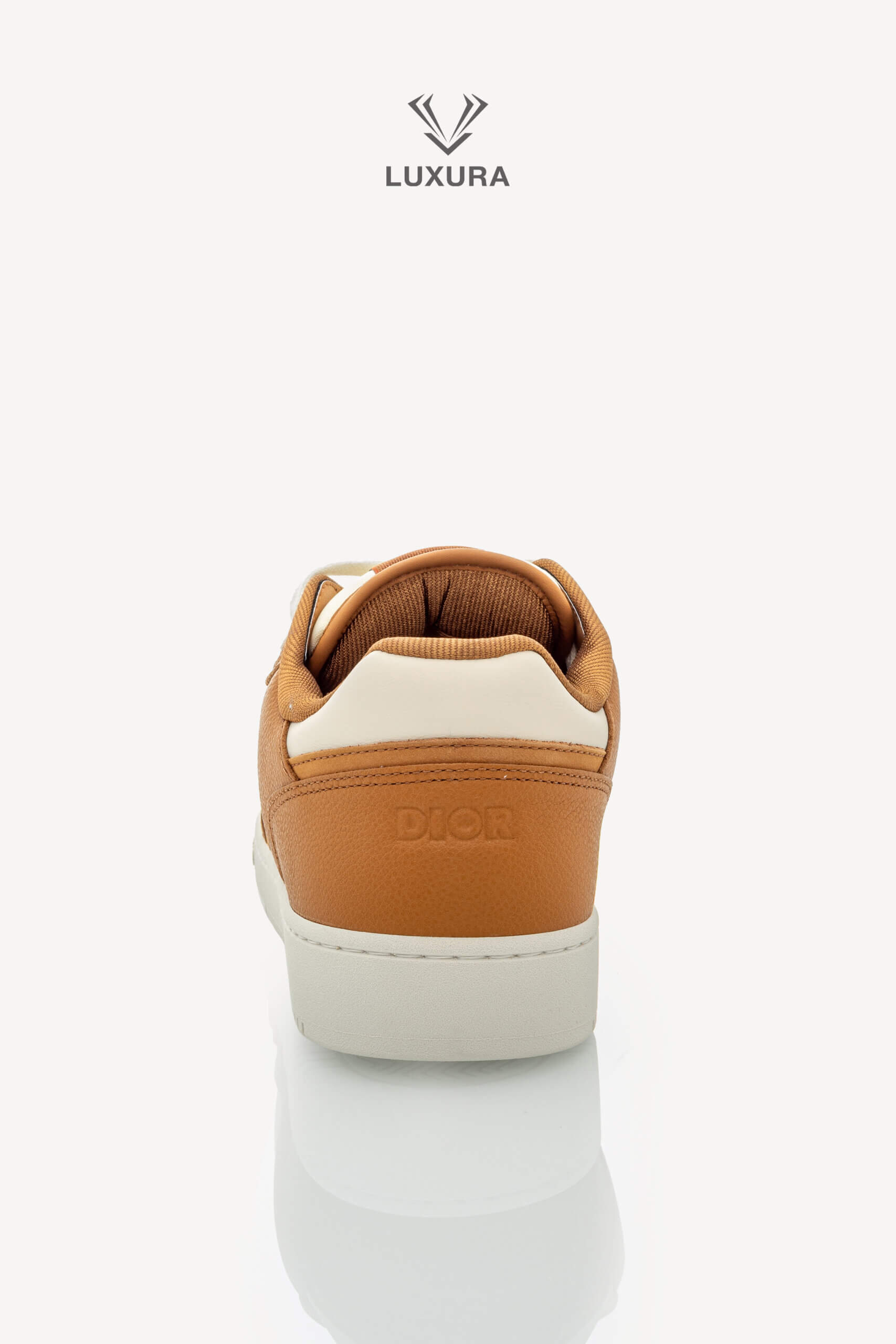 <span style="font-size: 10px;letter-spacing: .15em">NEW COLLECTION</span><br>            <strong>DIOR</strong><br>            <div style="margin-top:10px;font-size:16px">B27 Uptown Low-Top Sneaker Cognac and White with White Dior Gravity Leather 44 </div><br> - Image 15