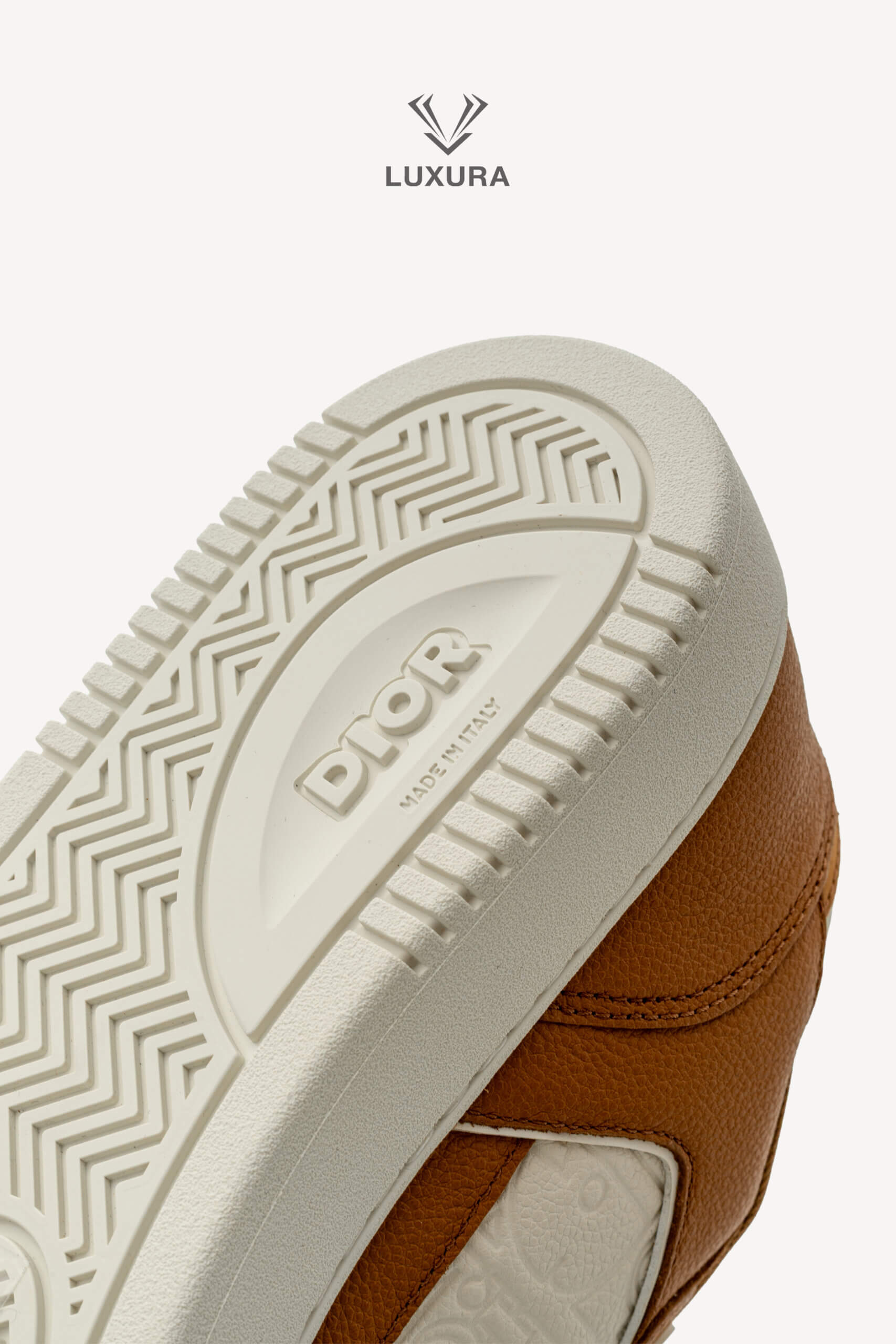 <span style="font-size: 10px;letter-spacing: .15em">NEW COLLECTION</span><br>            <strong>DIOR</strong><br>            <div style="margin-top:10px;font-size:16px">B27 Uptown Low-Top Sneaker Cognac and White with White Dior Gravity Leather 44 </div><br> - Image 21