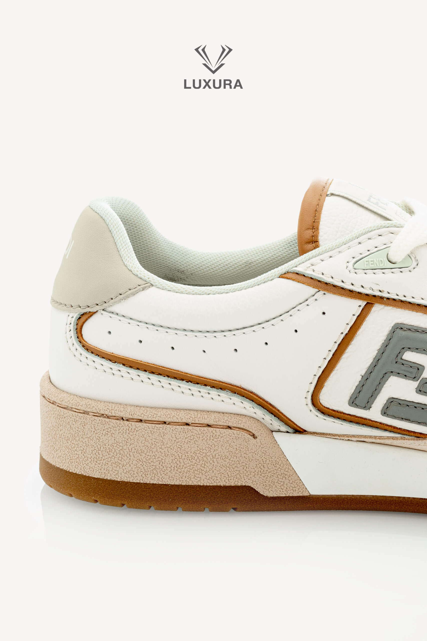 <span style="font-size: 10px;letter-spacing: .15em">NEW COLLECTION</span><br>            <strong>FENDI</strong><br>            <div style="margin-top:10px;font-size:16px">Match White and Brown leather and suede low tops 37</div><br> - Image 9