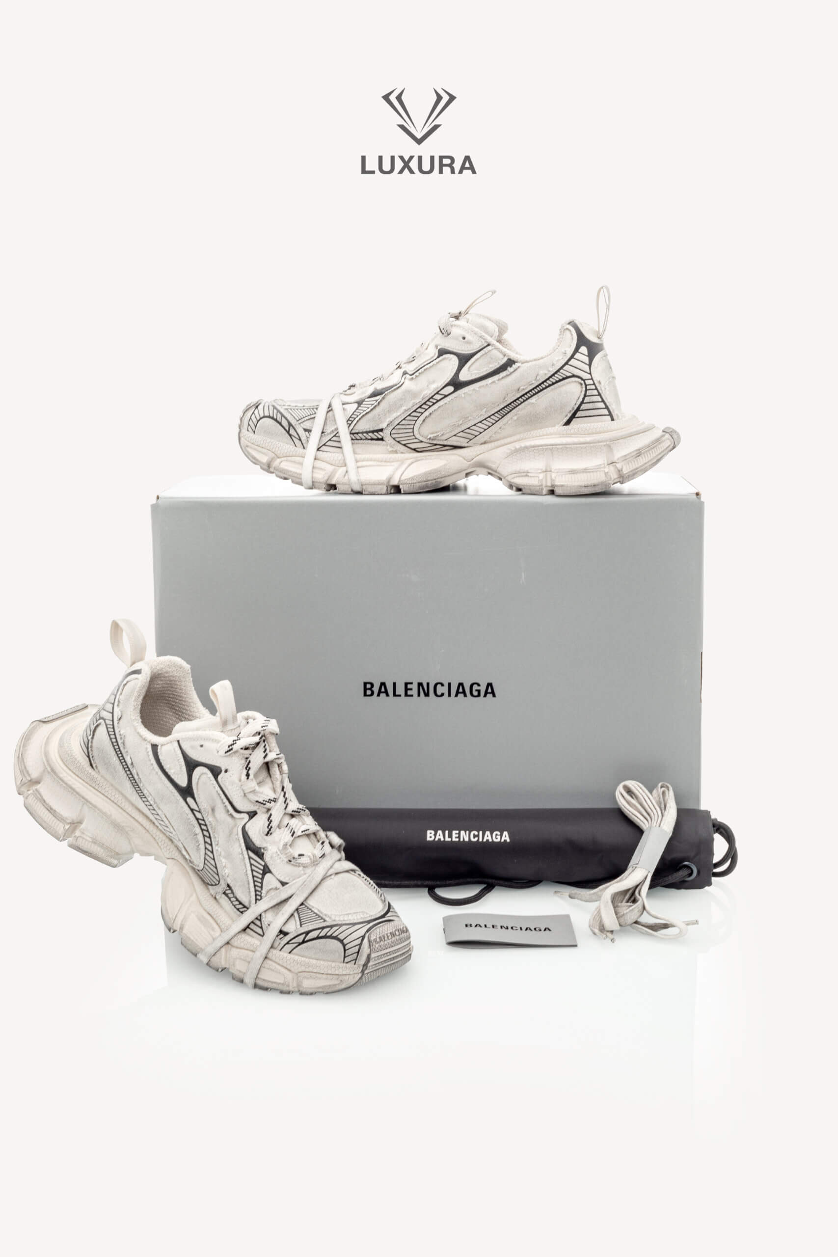 <span style="font-size: 10px;letter-spacing: .15em">IN TRENDING</span><br>            <strong>BALENCIAGA</strong><br>            <div style="margin-top:10px;font-size:16px">3XL Worn Out Light Grey Sneaker 43 </div><br> - Image 2