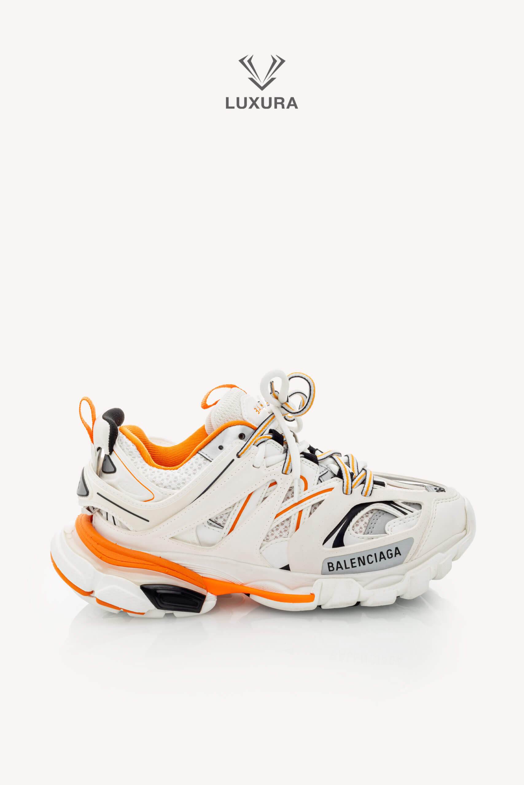 <span style="font-size: 10px;letter-spacing: .15em">IN TRENDING</span><br>            <strong>BALENCIAGA</strong><br>            <div style="margin-top:10px;font-size:16px">Track Sneakers in White and Orange Mesh and Nylon 36 [EXT]</div><br> - Image 10