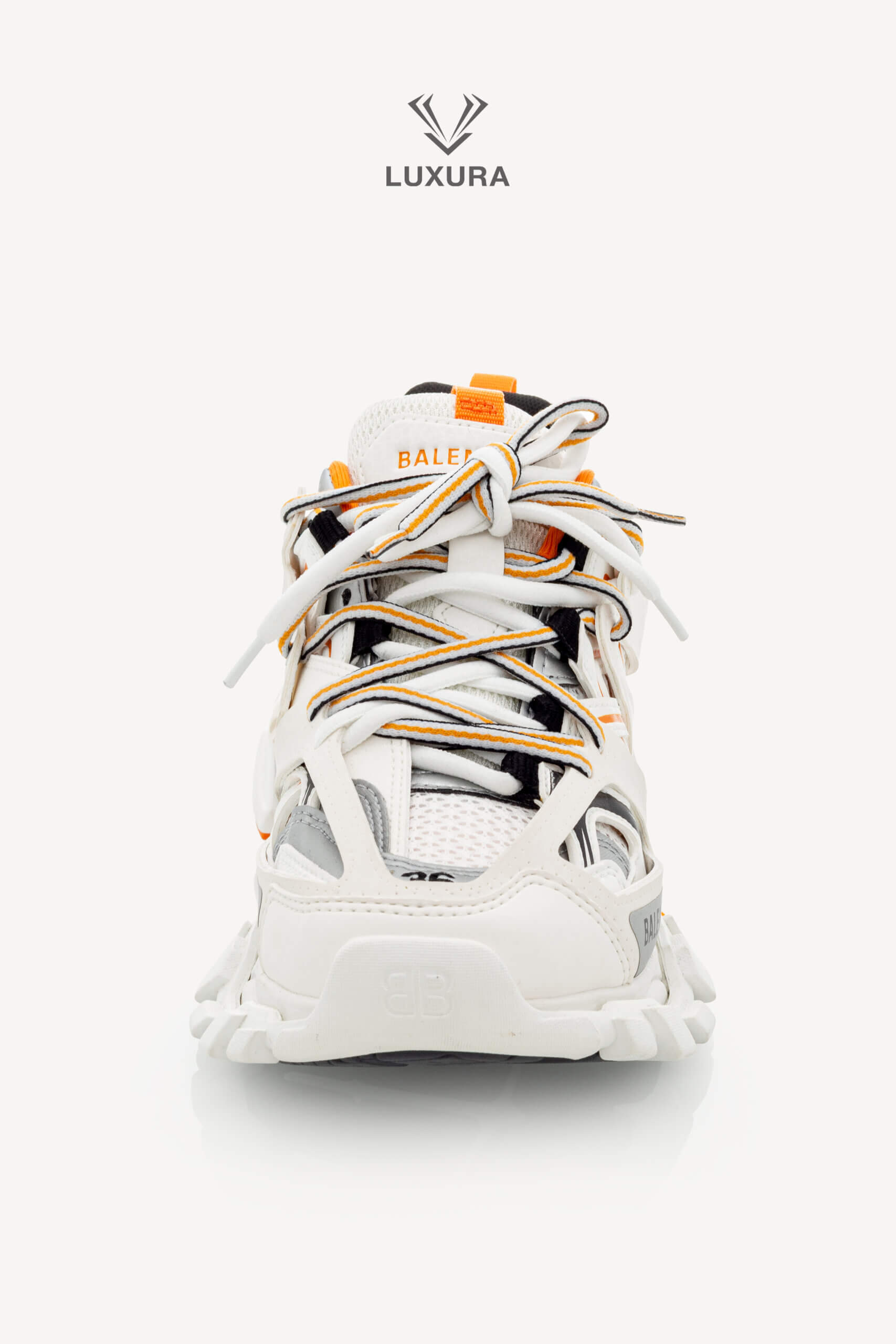 <span style="font-size: 10px;letter-spacing: .15em">IN TRENDING</span><br>            <strong>BALENCIAGA</strong><br>            <div style="margin-top:10px;font-size:16px">Track Sneakers in White and Orange Mesh and Nylon 36 [EXT]</div><br> - Image 8