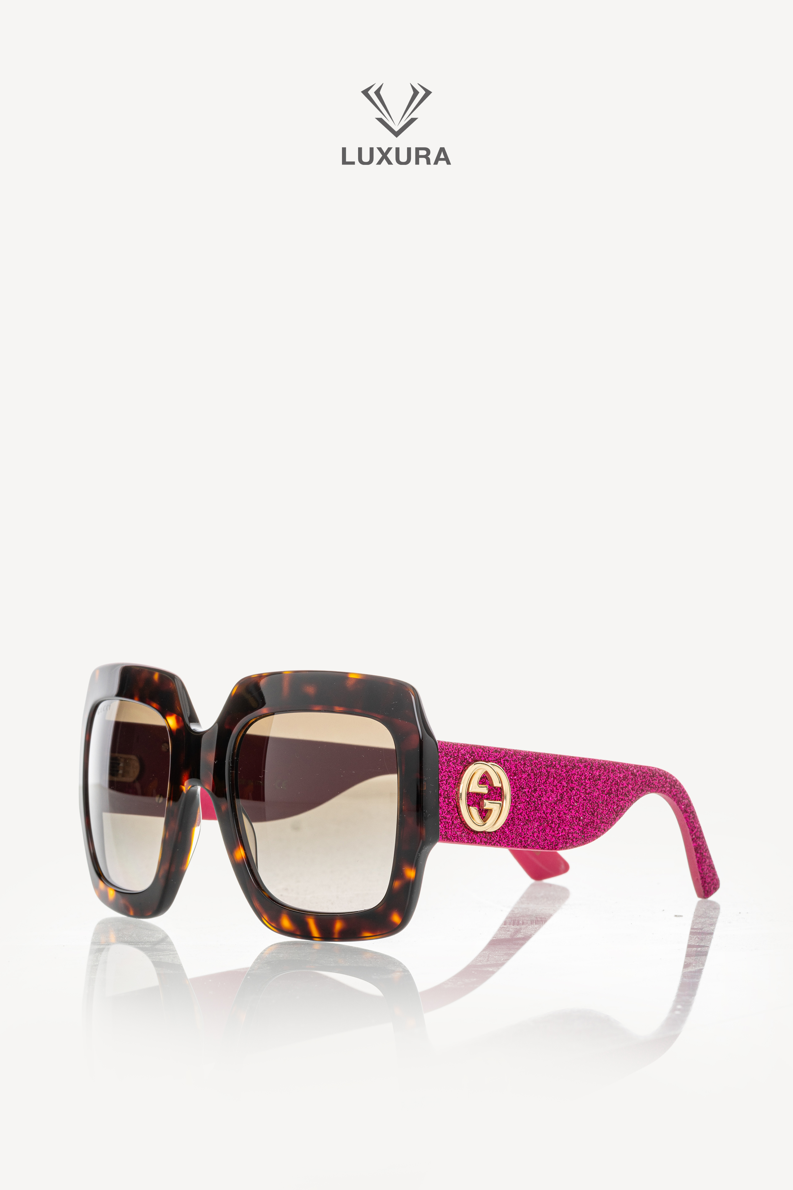 <span style="font-size: 10px; color: rgb(101, 101, 101);letter-spacing: .15em;">HARD TO FIND</span><br><strong> GUCCI </strong><br><div style="margin-top:10px; font-size:16px;">Tortoise Shell Acetate Pink Sunglasses GG0102S-003</div><br>
