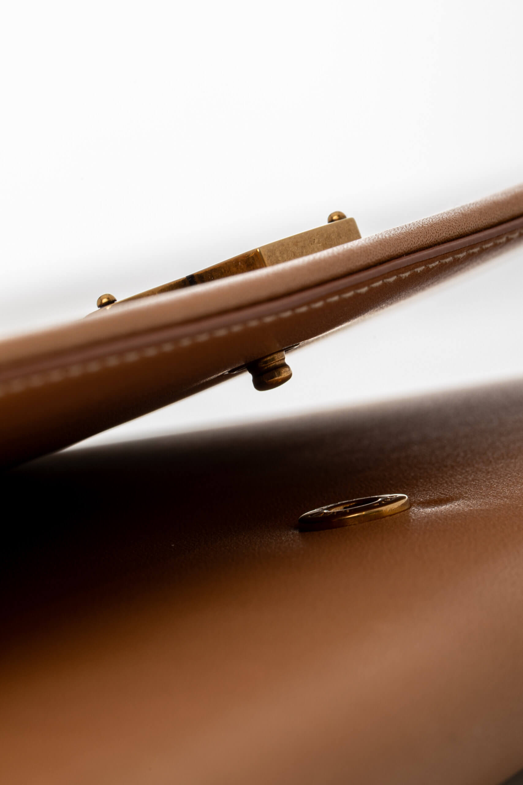 <span style="font-size: 10px;letter-spacing: .15em">HARD TO FIND</span><br>            <strong>SAINT LAURENT</strong><br>            <div style="margin-top:10px;font-size:16px">Nappa Calfskin Two-Toned Monogram Pouch Off-White Brown</div><br> - Image 12