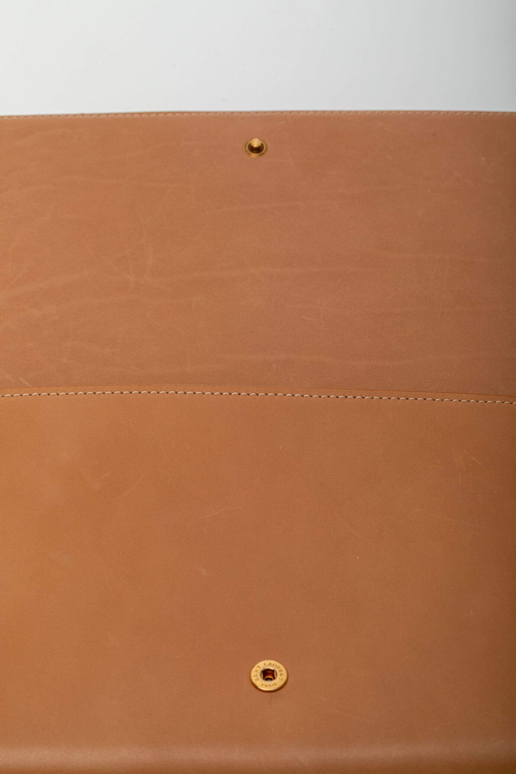 <span style="font-size: 10px;letter-spacing: .15em">HARD TO FIND</span><br>            <strong>SAINT LAURENT</strong><br>            <div style="margin-top:10px;font-size:16px">Nappa Calfskin Two-Toned Monogram Pouch Off-White Brown</div><br> - Image 17