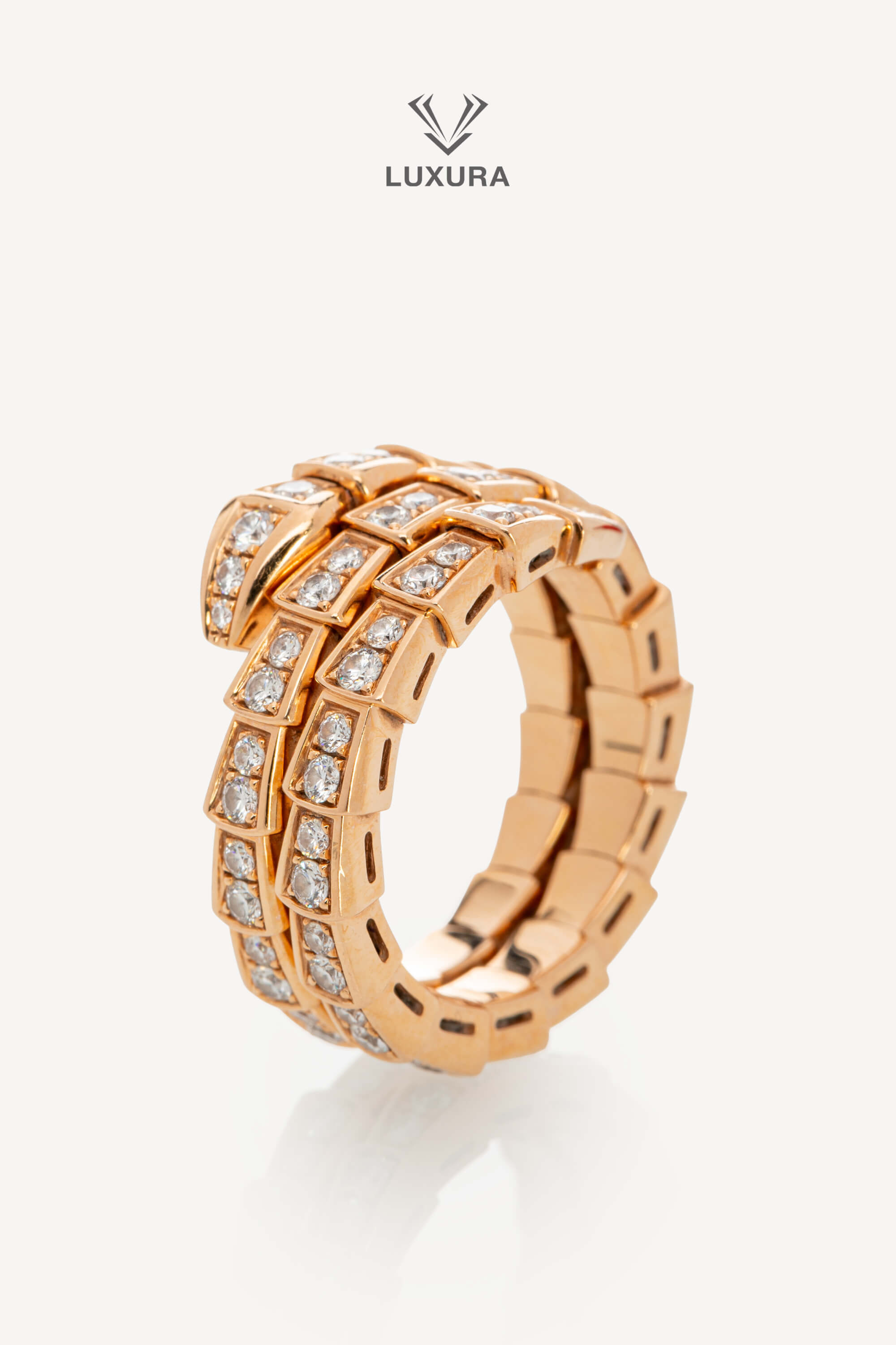 <span style="font-size: 10px; color: rgb(101, 101, 101);letter-spacing: .15em;">HARD TO FIND</span><br><strong> BVLGARI </strong><br><div style="margin-top:10px; font-size:16px;"> Serpenti Viper 18k Rose Gold Ring with full pave Diamonds </div><br>