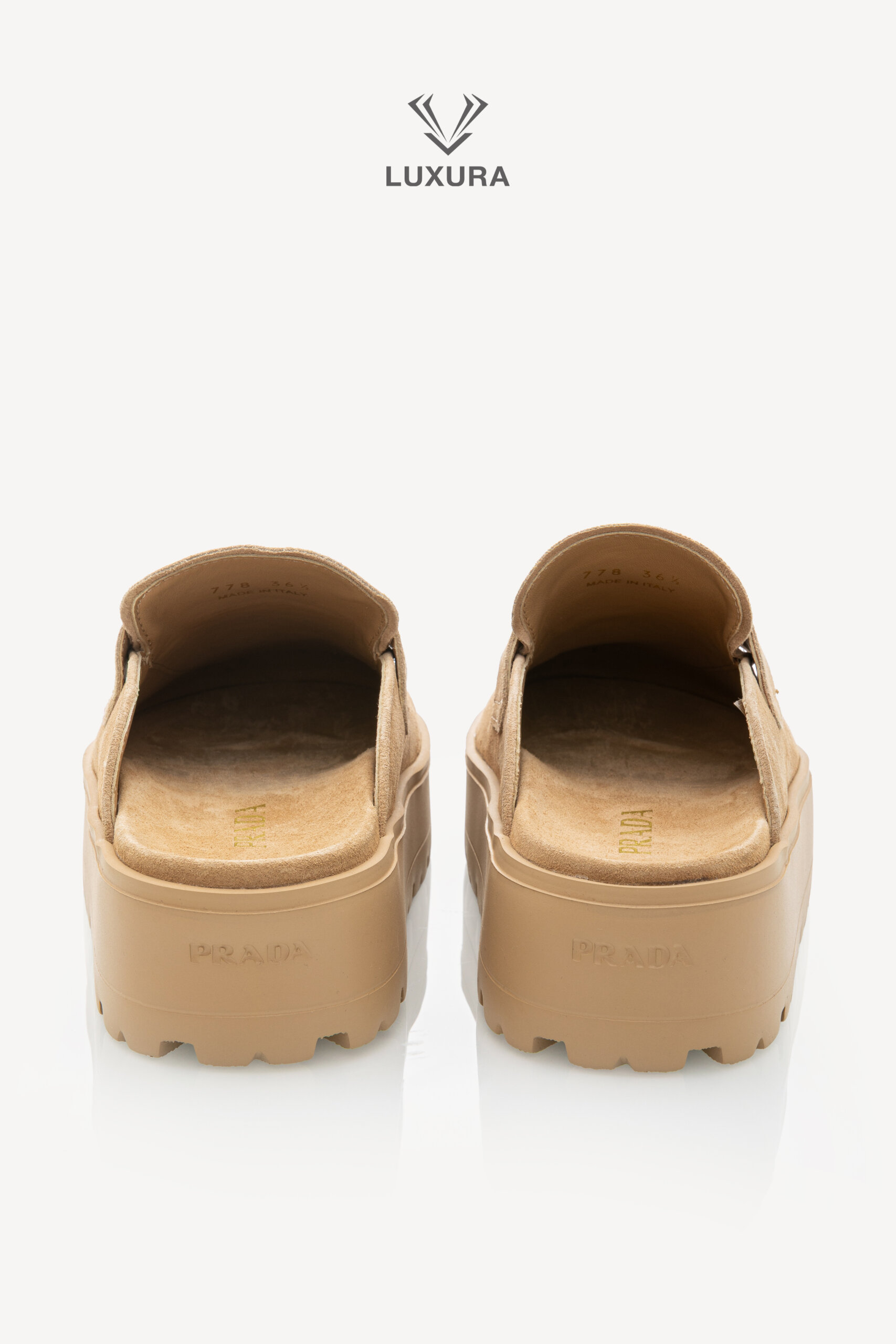 <span style="font-size: 10px;letter-spacing: .15em">NEW COLLECTION</span><br>            <strong>PRADA</strong><br>            <div style="margin-top:10px;font-size:16px">Triangle-Logo Round-Toe Slippers 36.5</div><br> - Image 6