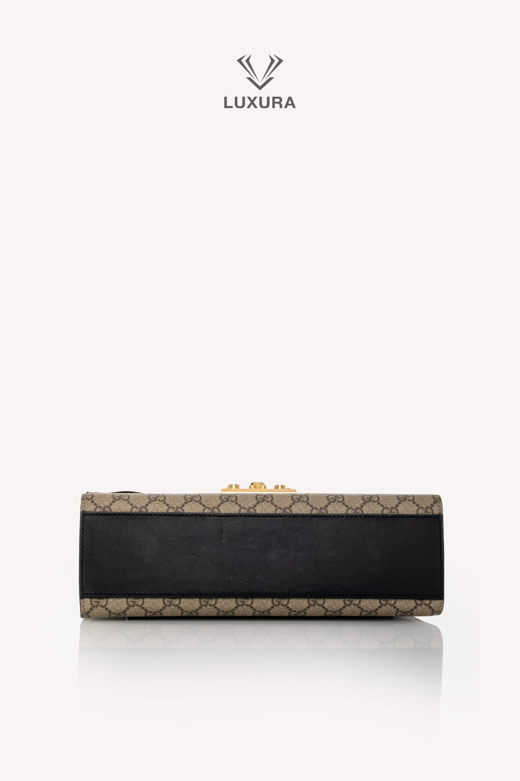 <span style="font-size: 10px;letter-spacing: .15em">IN TRENDING</span><br> <strong>GUCCI</strong><br> <div style="margin-top:10px;font-size:16px">Supreme Monogram Calfskin Medium Padlock Shoulder Bag Brown Black</div><br> - Image 28