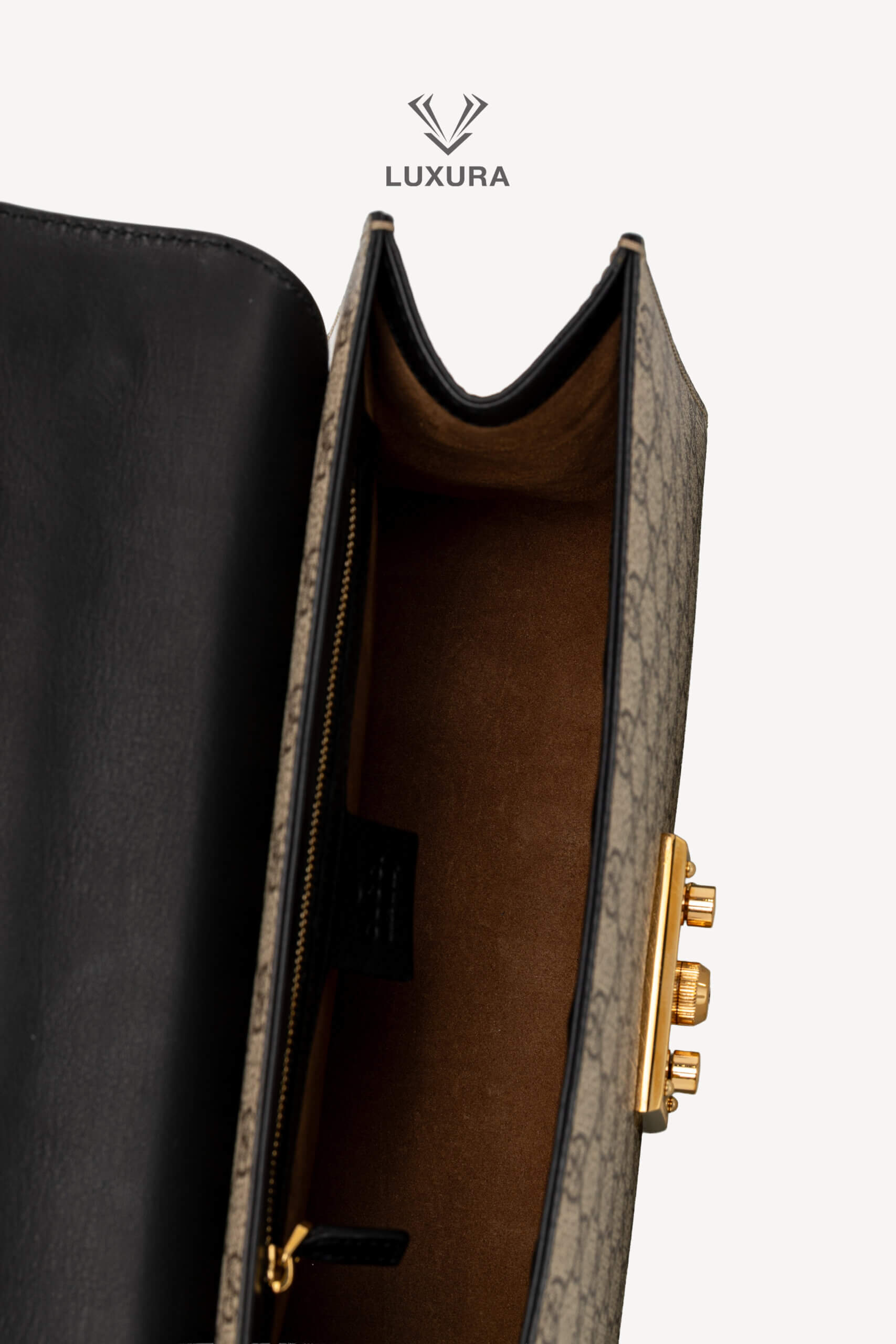 <span style="font-size: 10px;letter-spacing: .15em">IN TRENDING</span><br> <strong>GUCCI</strong><br> <div style="margin-top:10px;font-size:16px">Supreme Monogram Calfskin Medium Padlock Shoulder Bag Brown Black</div><br> - Image 14