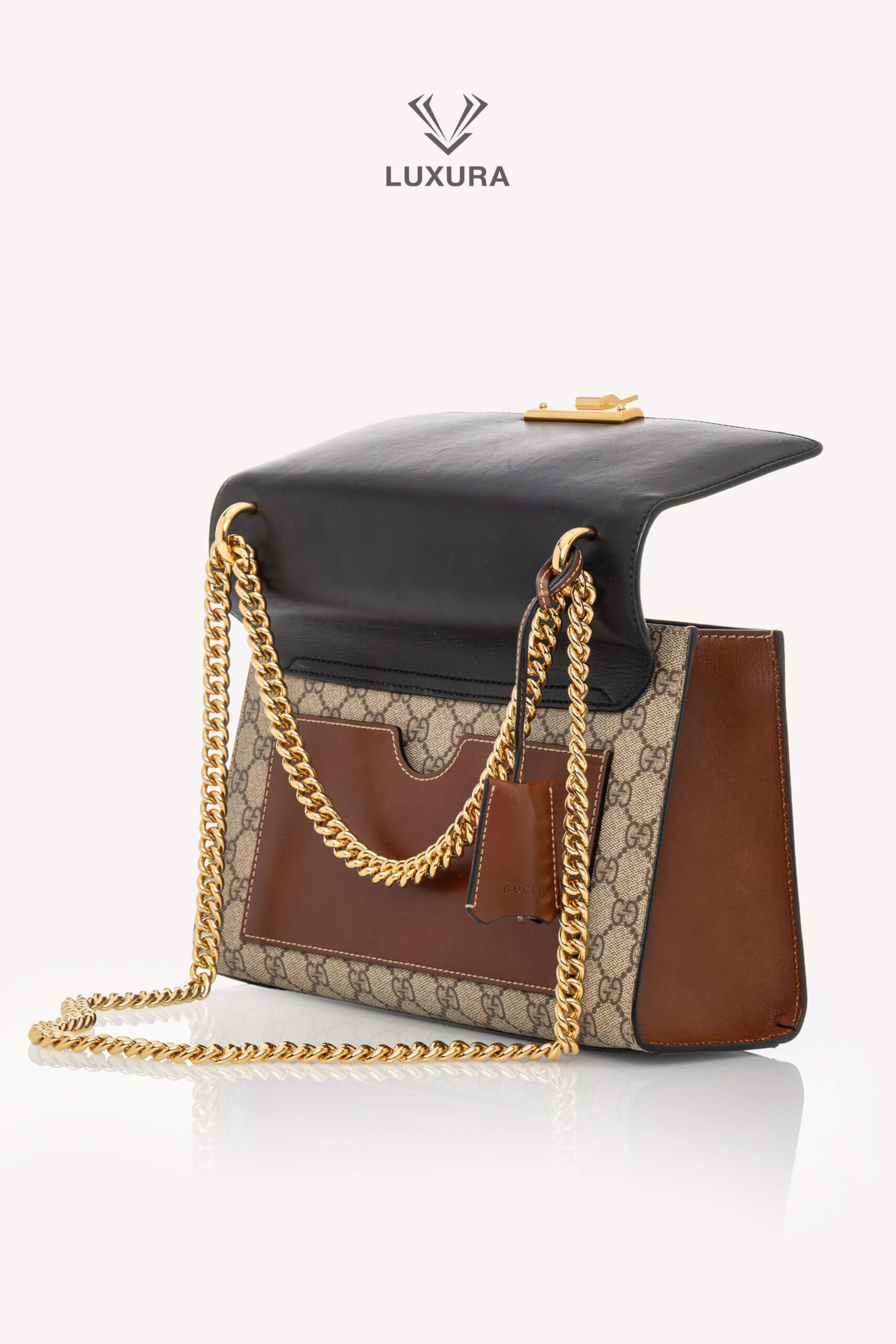 <span style="font-size: 10px;letter-spacing: .15em">IN TRENDING</span><br> <strong>GUCCI</strong><br> <div style="margin-top:10px;font-size:16px">Supreme Monogram Calfskin Medium Padlock Shoulder Bag Brown Black</div><br> - Image 8
