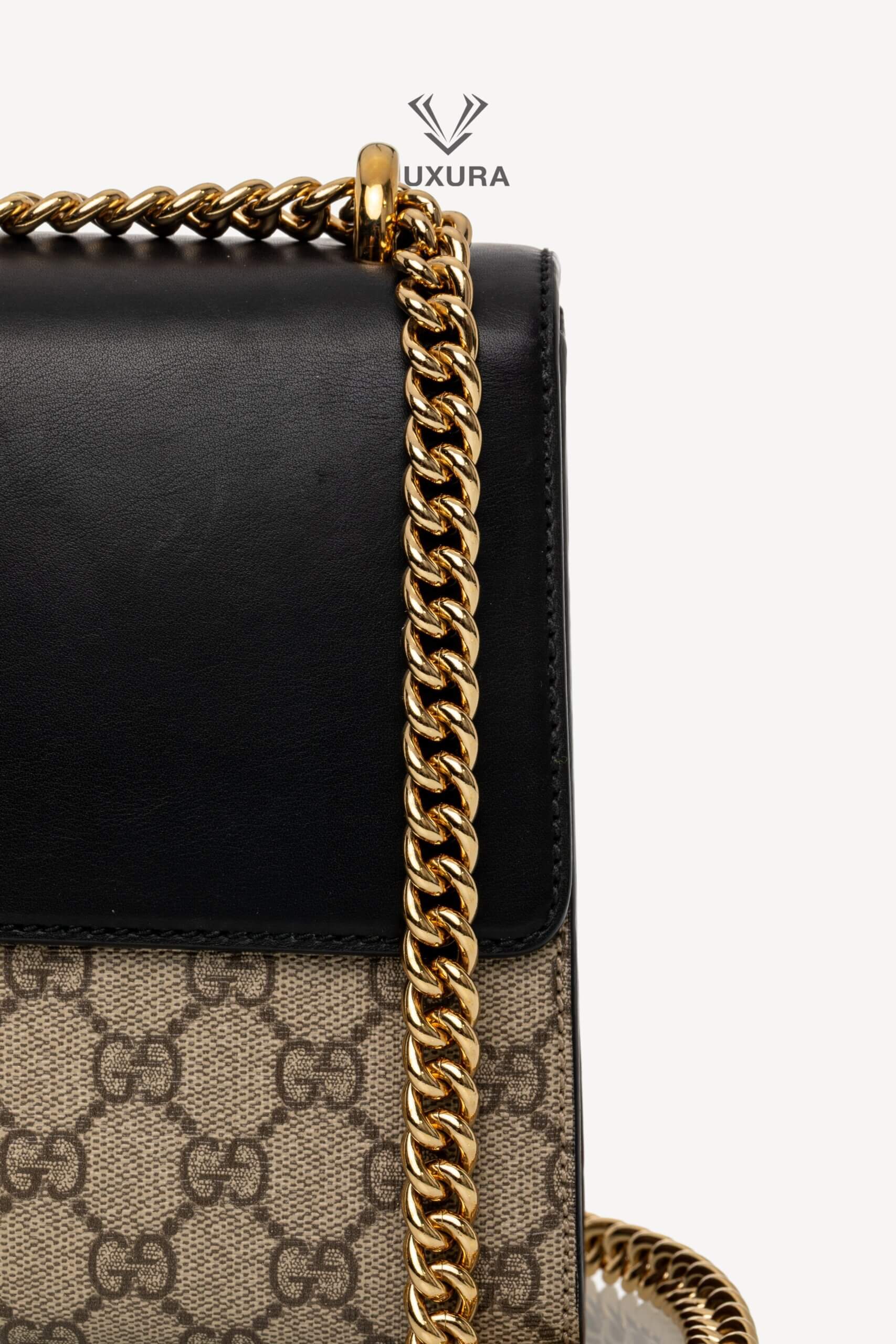 <span style="font-size: 10px;letter-spacing: .15em">IN TRENDING</span><br> <strong>GUCCI</strong><br> <div style="margin-top:10px;font-size:16px">Supreme Monogram Calfskin Medium Padlock Shoulder Bag Brown Black</div><br> - Image 16