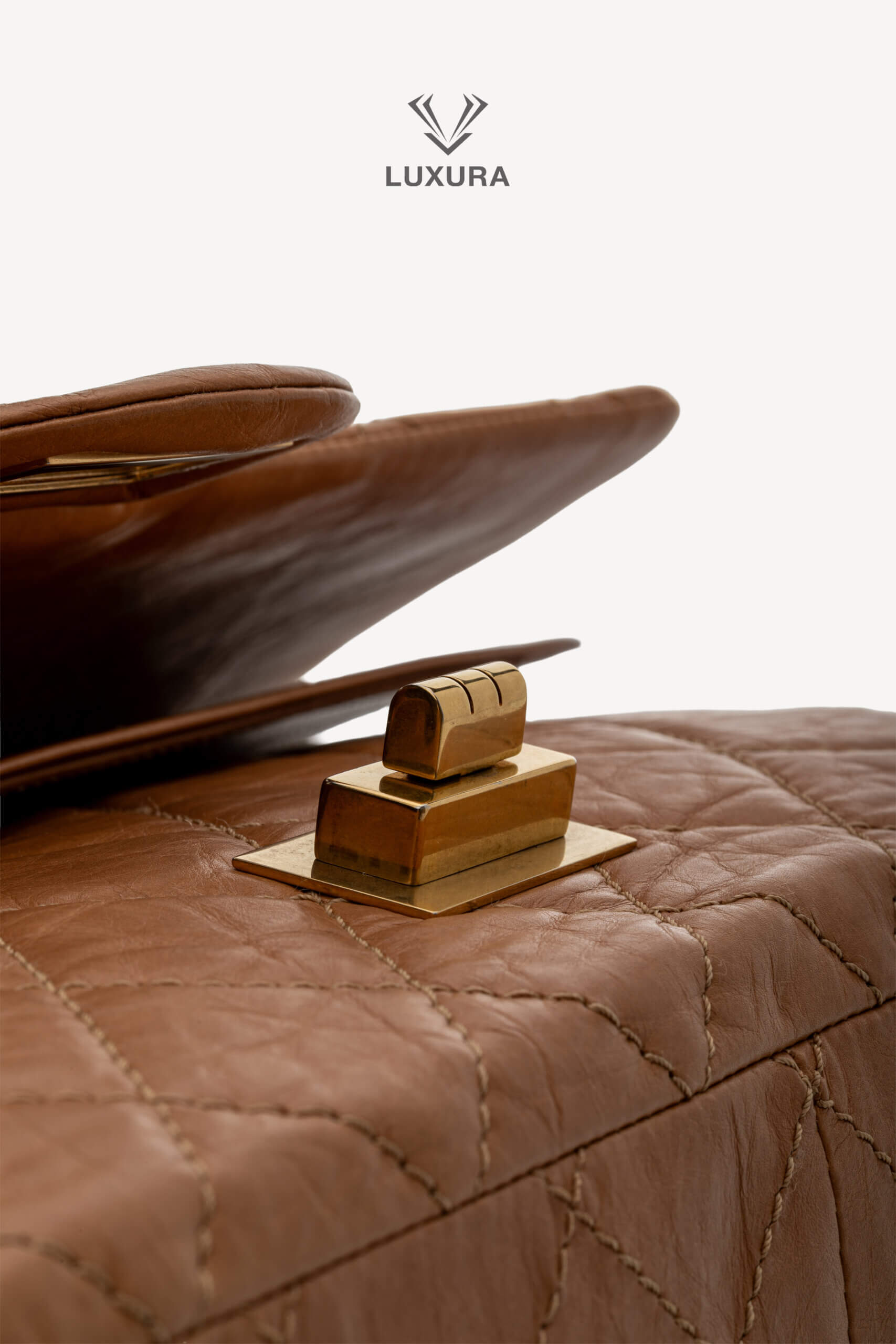 <span style="font-size: 10px;letter-spacing: .15em">HARD TO FIND</span><br><strong>CHANEL</strong><br><div style="margin-top:10px;font-size:16px">2.55 Dark Beige Distressed Calf with Gold Hardware</div><br> - Image 2