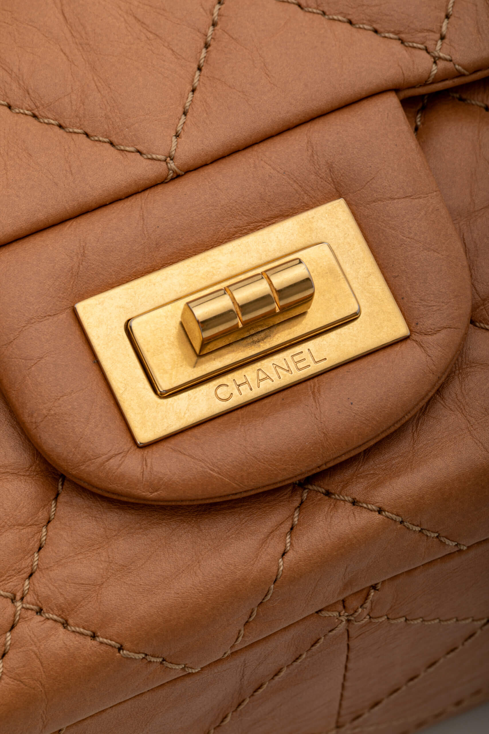 <span style="font-size: 10px;letter-spacing: .15em">HARD TO FIND</span><br><strong>CHANEL</strong><br><div style="margin-top:10px;font-size:16px">2.55 Dark Beige Distressed Calf with Gold Hardware</div><br> - Image 17