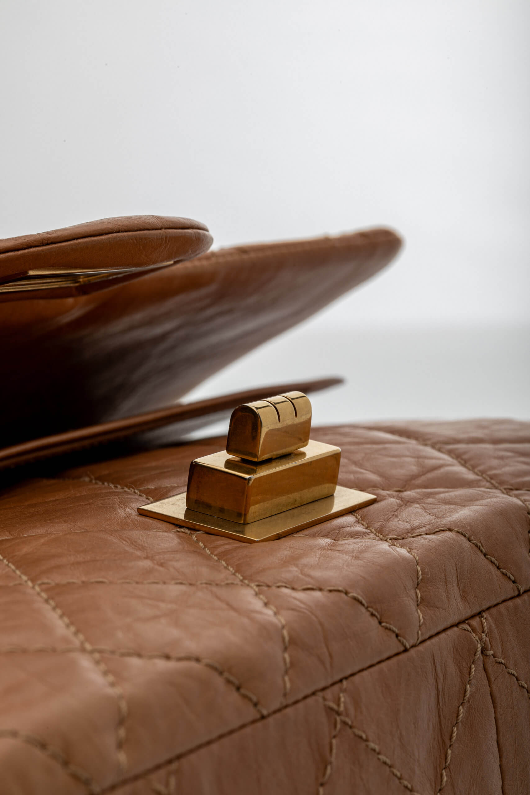 <span style="font-size: 10px;letter-spacing: .15em">HARD TO FIND</span><br><strong>CHANEL</strong><br><div style="margin-top:10px;font-size:16px">2.55 Dark Beige Distressed Calf with Gold Hardware</div><br> - Image 18