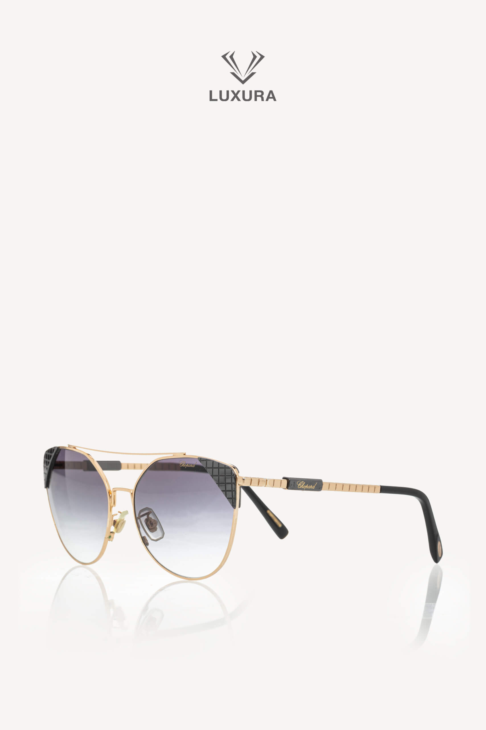 <span style="font-size: 10px;letter-spacing: .15em">HARD TO FIND</span><br> <strong>CHOPARD</strong><br> <div style="margin-top:10px;font-size:16px">SCHC40 300 Sunglasses Black</div><br>