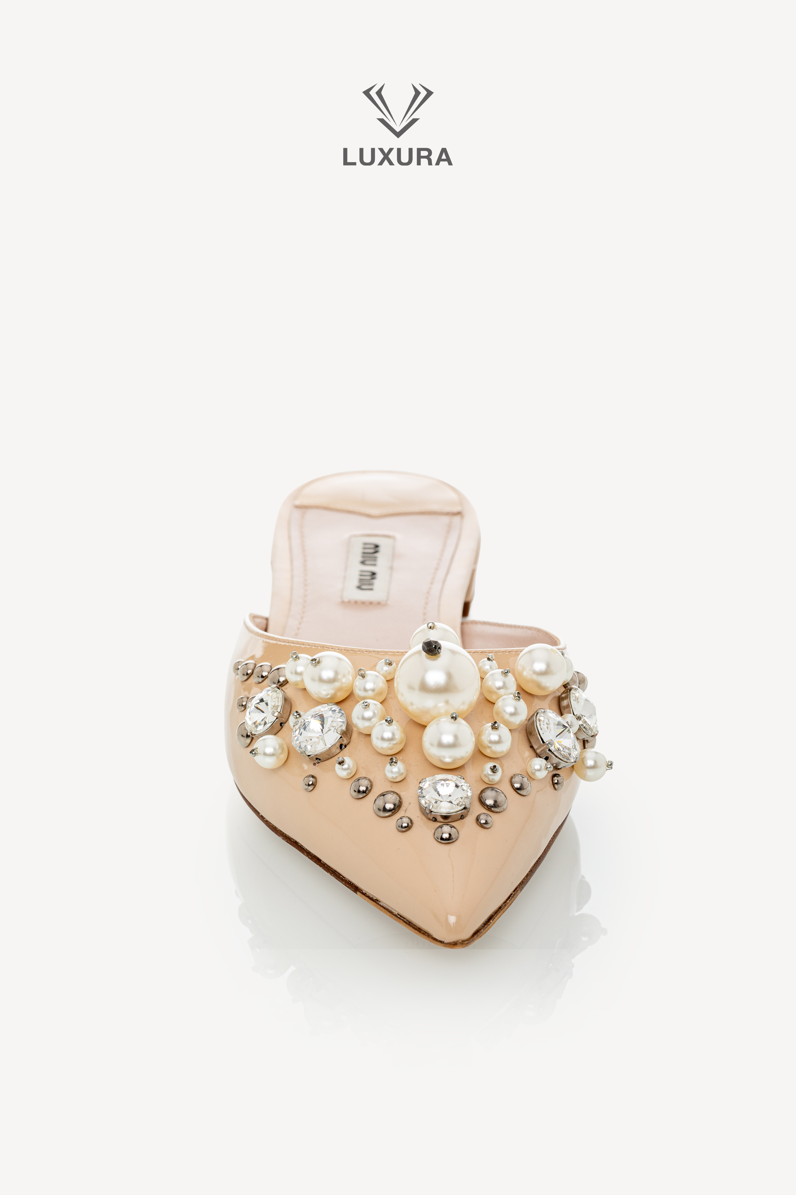 <span style="font-size: 10px;letter-spacing: .15em">BEST DEAL</span><br> <strong>MIU MIU</strong><br> <div style="margin-top:10px;font-size:16px">Patent Leather Faux Pearl Embellished Pointed Toe Mules Nude 37.5</div><br> - Image 4