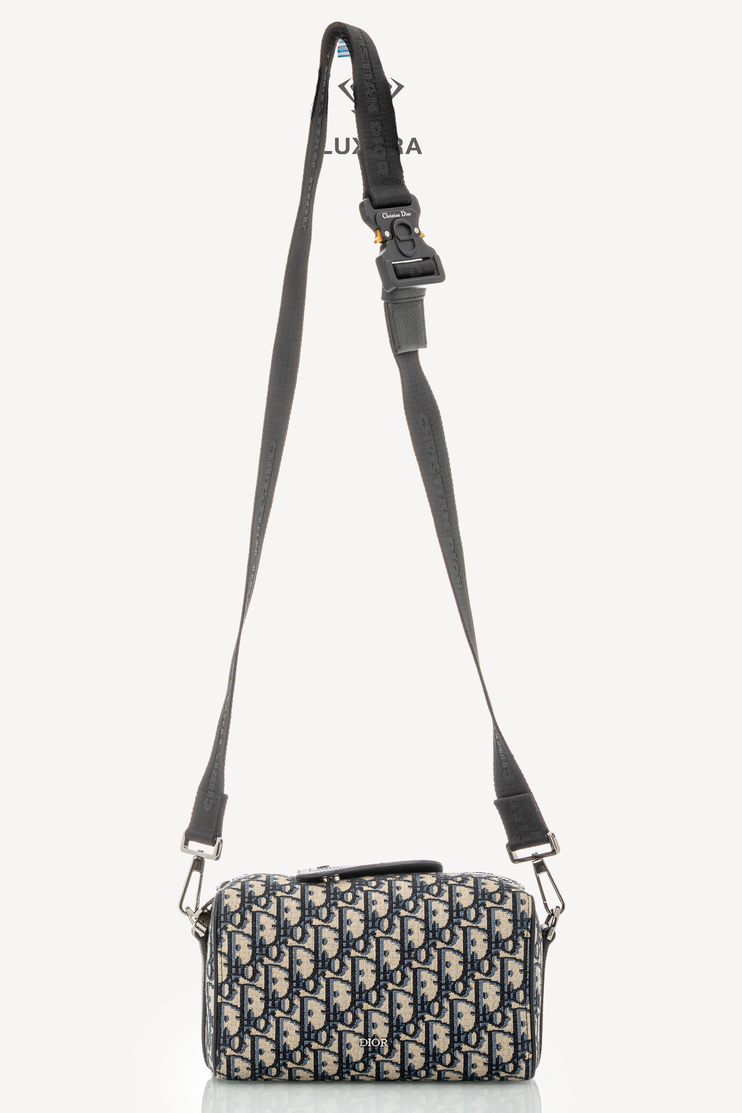 <span style="font-size: 10px;letter-spacing: .15em"></span><br> <strong>CHRISTIAN DIOR</strong><br> <div style="margin-top:10px;font-size:16px">Jacquard Grained Calfskin Lingot 22 Pouch Beige Blue</div><br> - Image 3