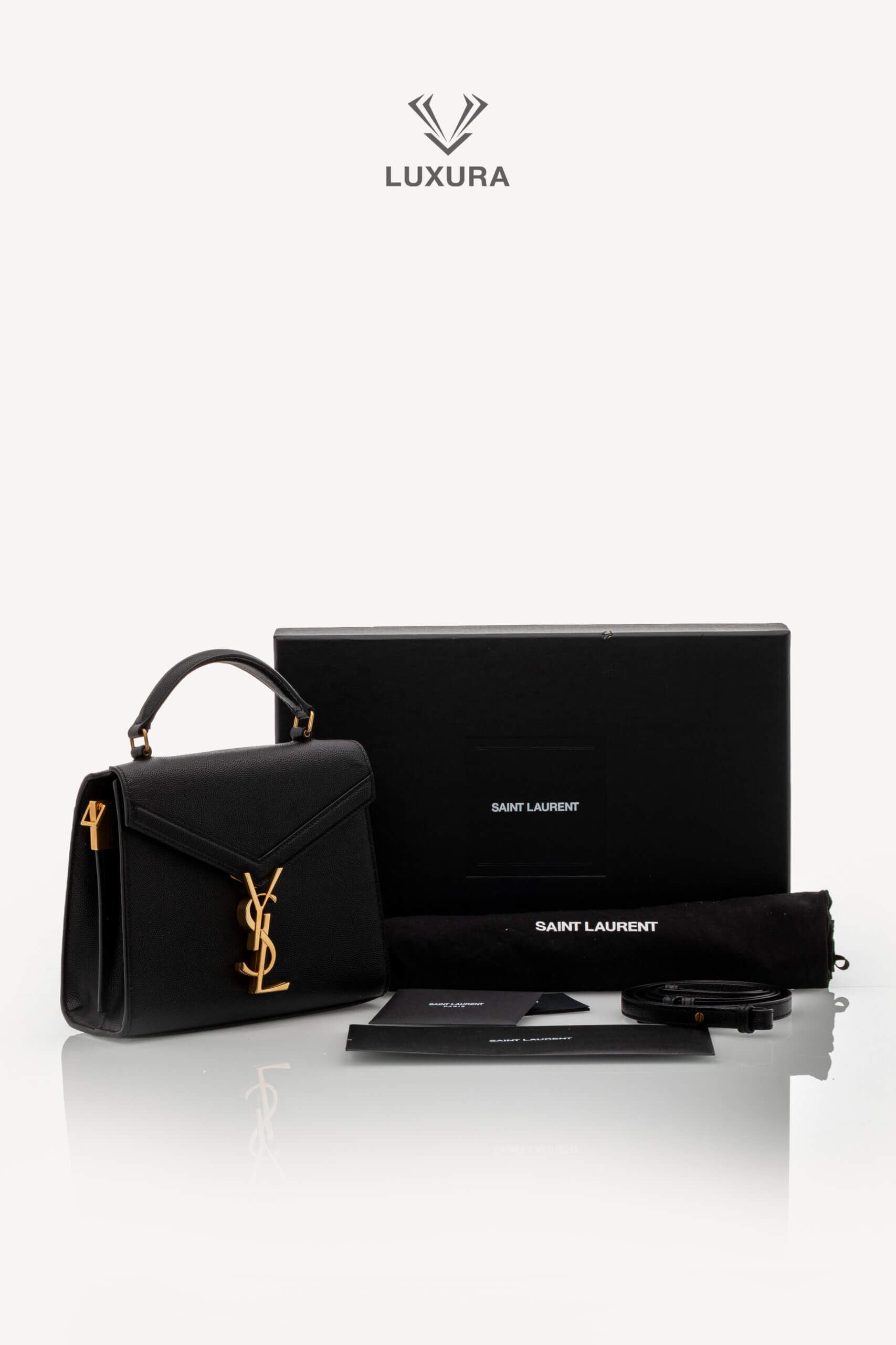 <span style="font-size: 10px;letter-spacing: .15em">HARD TO FIND</span><br>            <strong>SAINT LAURENT</strong><br>            <div style="margin-top:10px;font-size:16px">Cassandra Mini Top Handle In Grain De Poudre Embossed Leather Black</div><br> - Image 2
