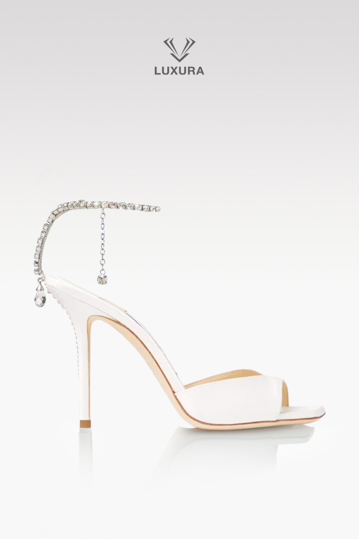 <span style="font-size: 10px;letter-spacing: .15em"></span><br>
            <strong>JIMMY CHOO</strong><br>
            <div style="margin-top:10px;font-size:16px">Saeda 85 Crystal Embellished Satin Sandals Ivory 35.5</div><br>