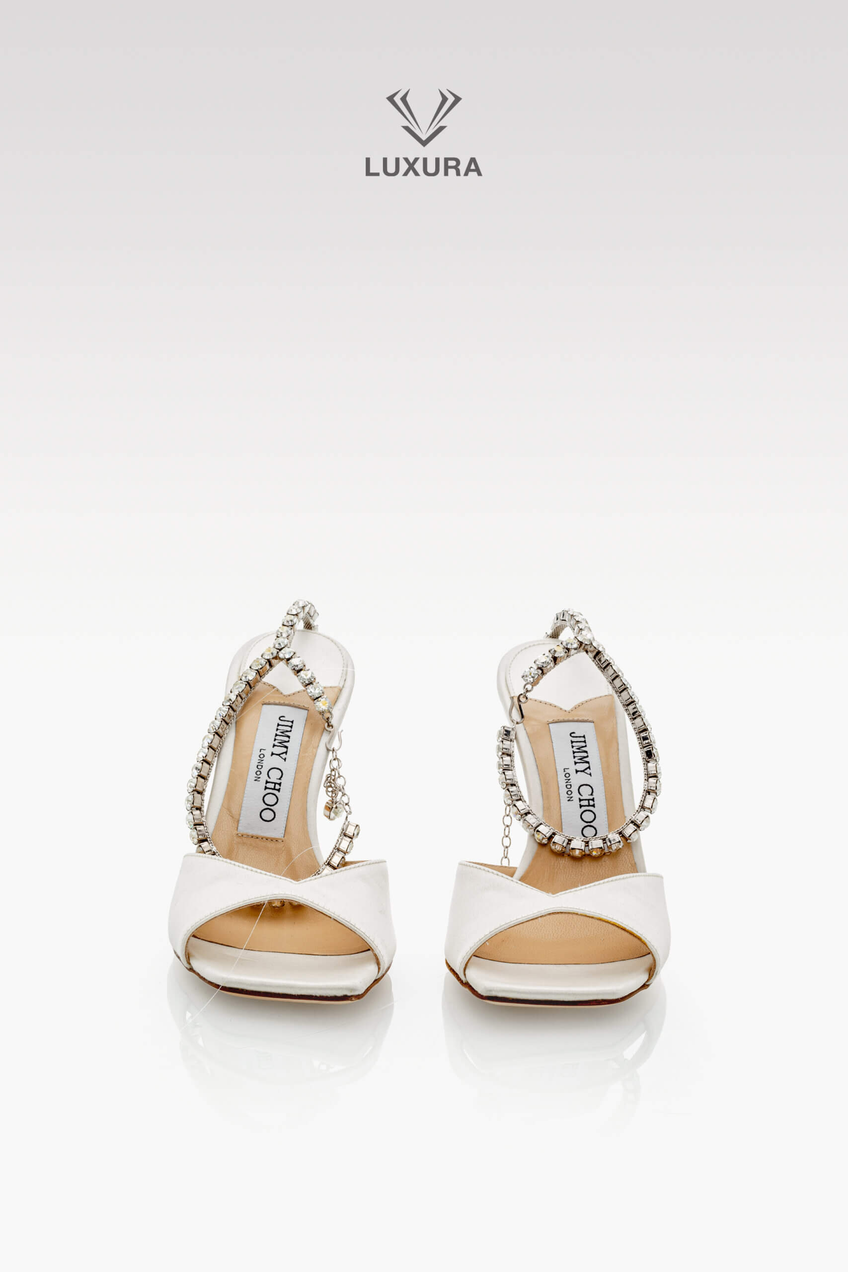 <span style="font-size: 10px;letter-spacing: .15em"></span><br>
<strong>JIMMY CHOO</strong><br>
<div style="margin-top:10px;font-size:16px">Saeda 85 Crystal Embellished Satin Sandals Ivory 35.5</div><br> - Image 3
