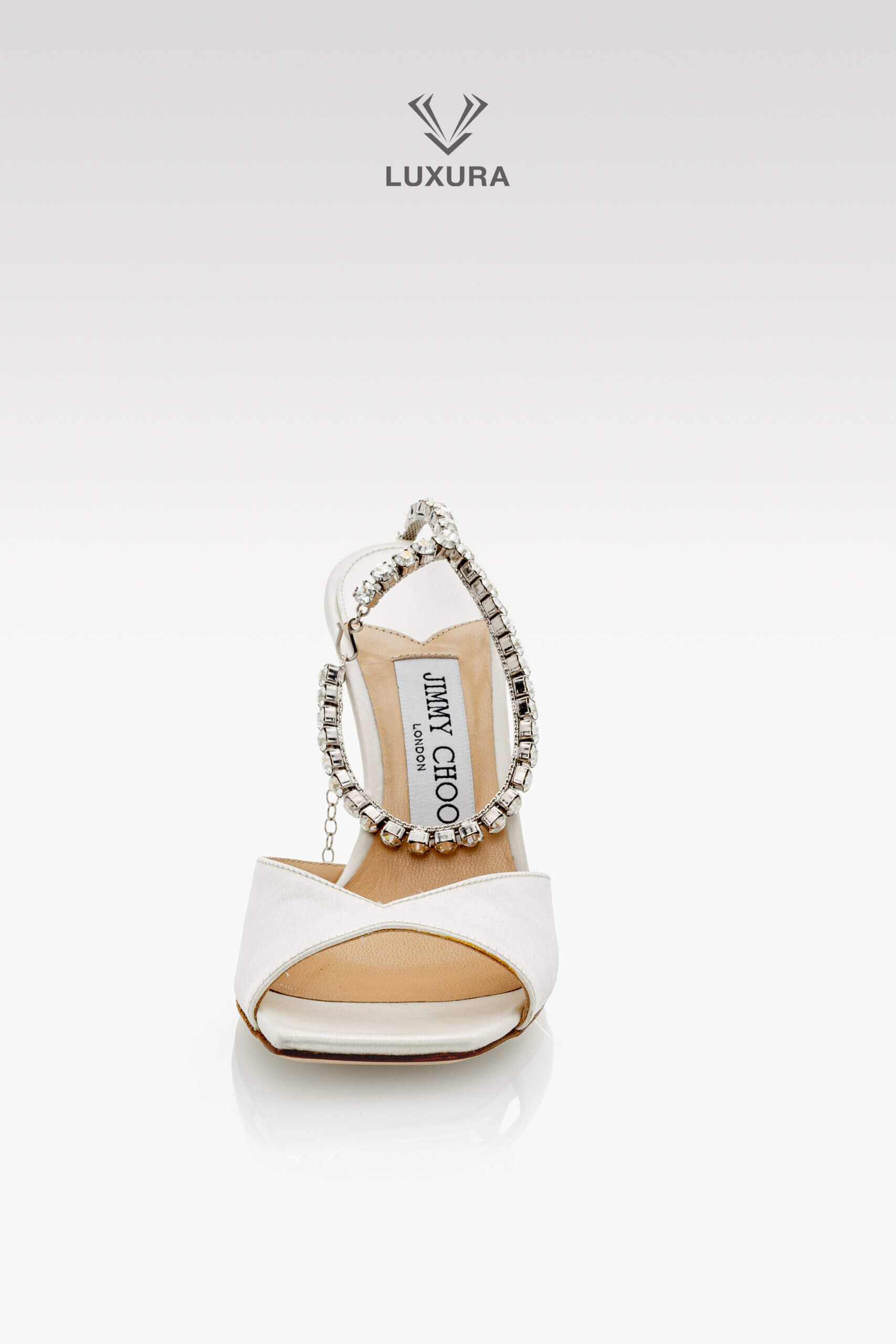 <span style="font-size: 10px;letter-spacing: .15em"></span><br>
<strong>JIMMY CHOO</strong><br>
<div style="margin-top:10px;font-size:16px">Saeda 85 Crystal Embellished Satin Sandals Ivory 35.5</div><br> - Image 6