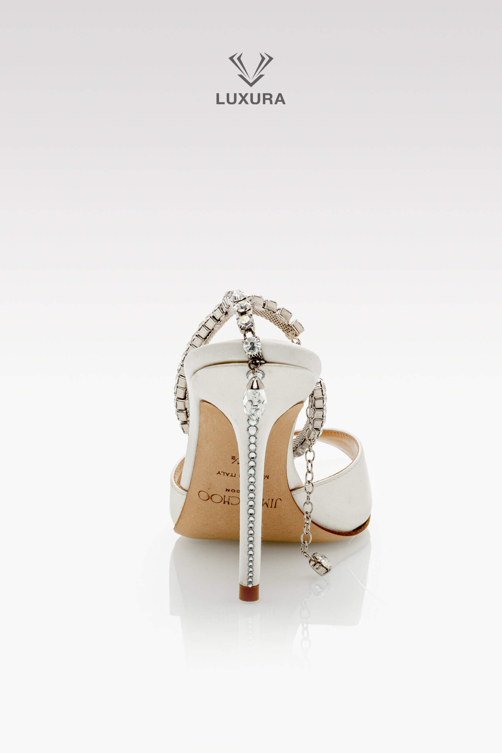 <span style="font-size: 10px;letter-spacing: .15em"></span><br>
<strong>JIMMY CHOO</strong><br>
<div style="margin-top:10px;font-size:16px">Saeda 85 Crystal Embellished Satin Sandals Ivory 35.5</div><br> - Image 7