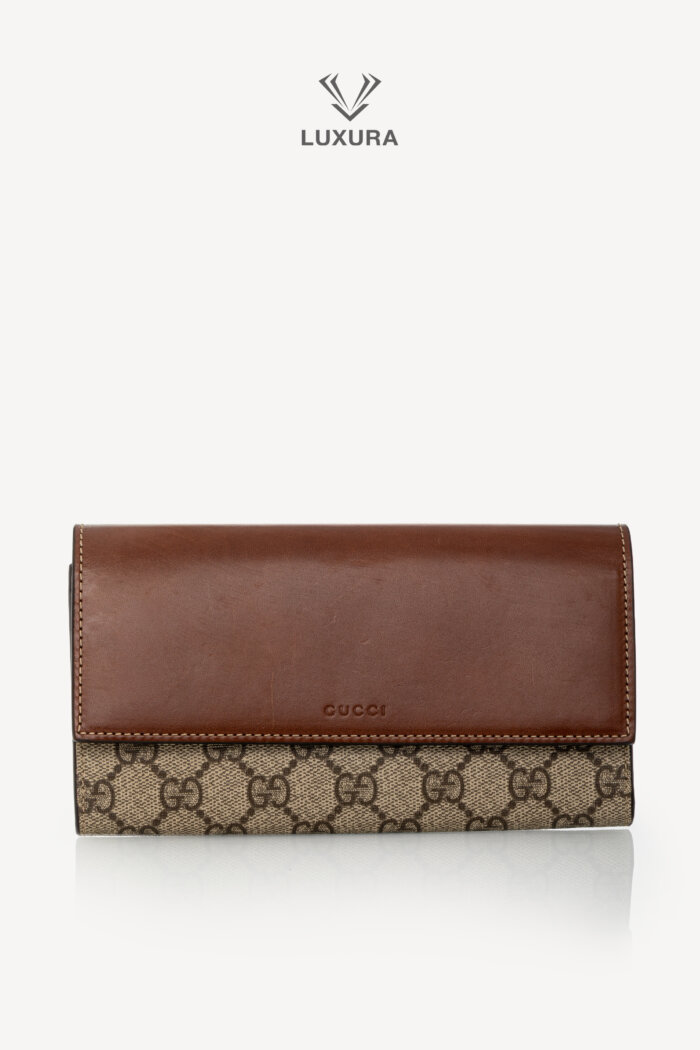 <span style="font-size: 10px;letter-spacing: .15em">HARD TO FIND</span><br>            <strong>GUCCI</strong><br>            <div style="margin-top:10px;font-size:16px">Monogram Continental Wallet Brown</div><br>