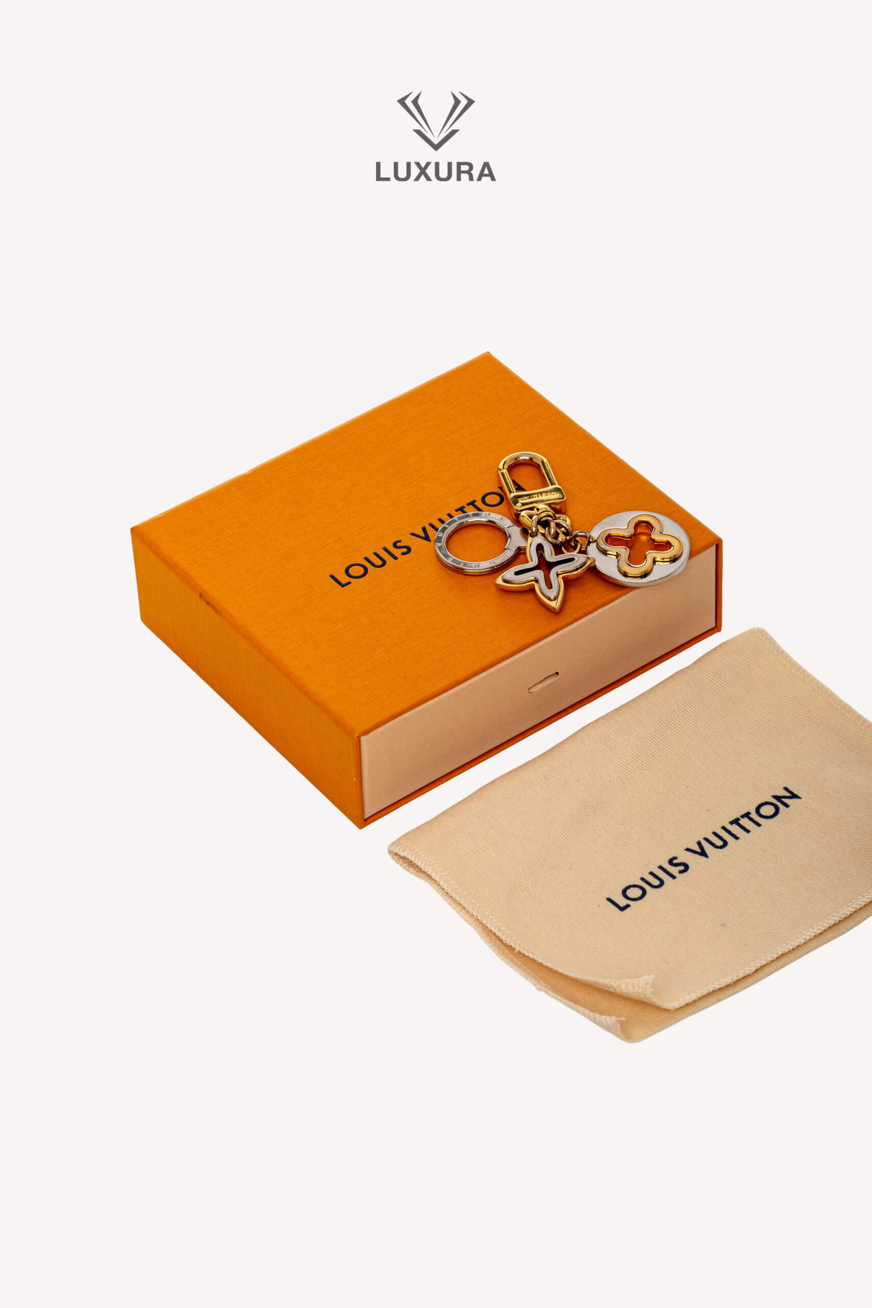 <span style="font-size: 10px;letter-spacing: .15em">HARD TO FIND</span><br> <strong>LOUIS VUITTON</strong><br> <div style="margin-top:10px;font-size:16px">Insolence Key Holder-Bag Charm</div><br> - Image 2
