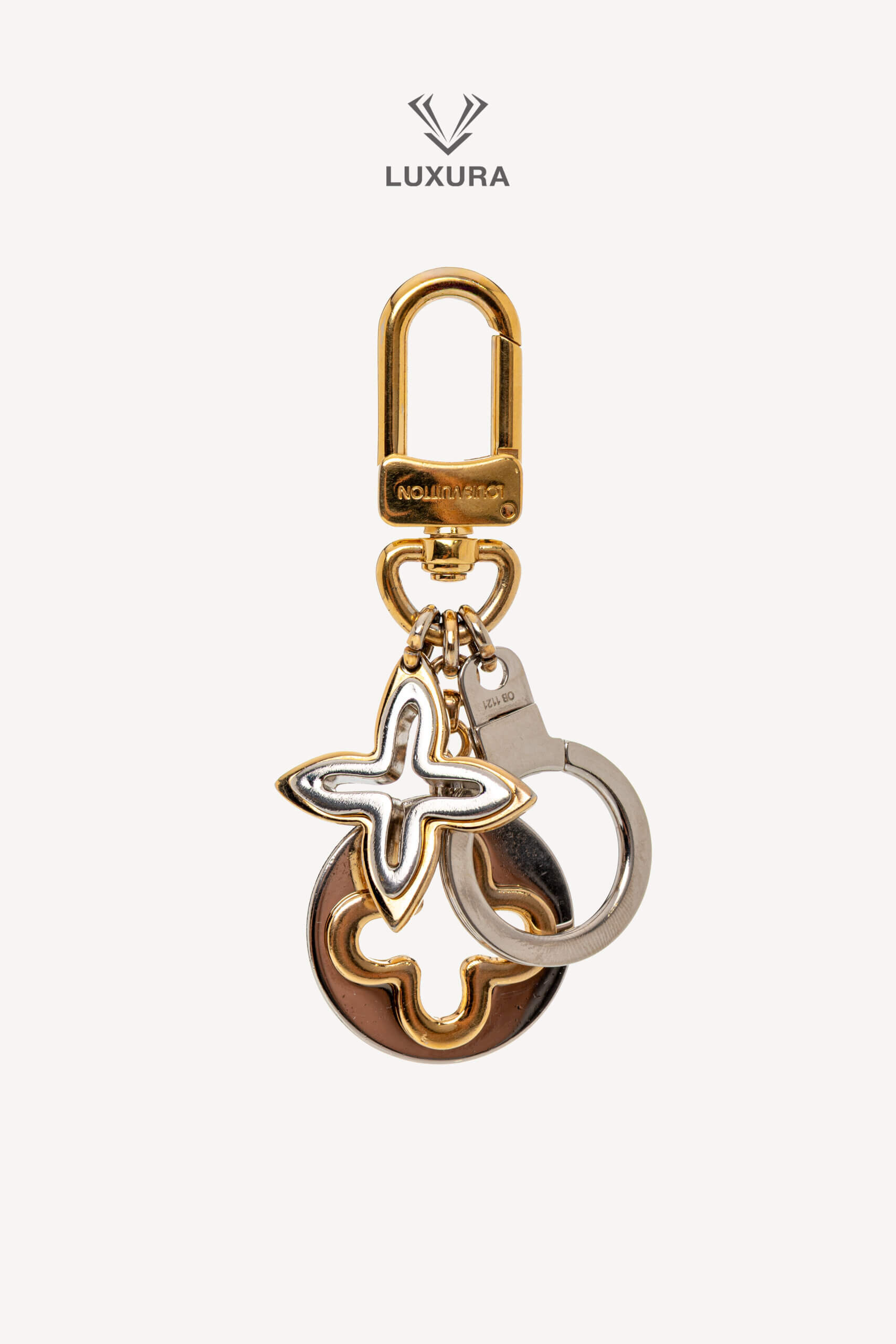 <span style="font-size: 10px;letter-spacing: .15em">HARD TO FIND</span><br> <strong>LOUIS VUITTON</strong><br> <div style="margin-top:10px;font-size:16px">Insolence Key Holder-Bag Charm</div><br>