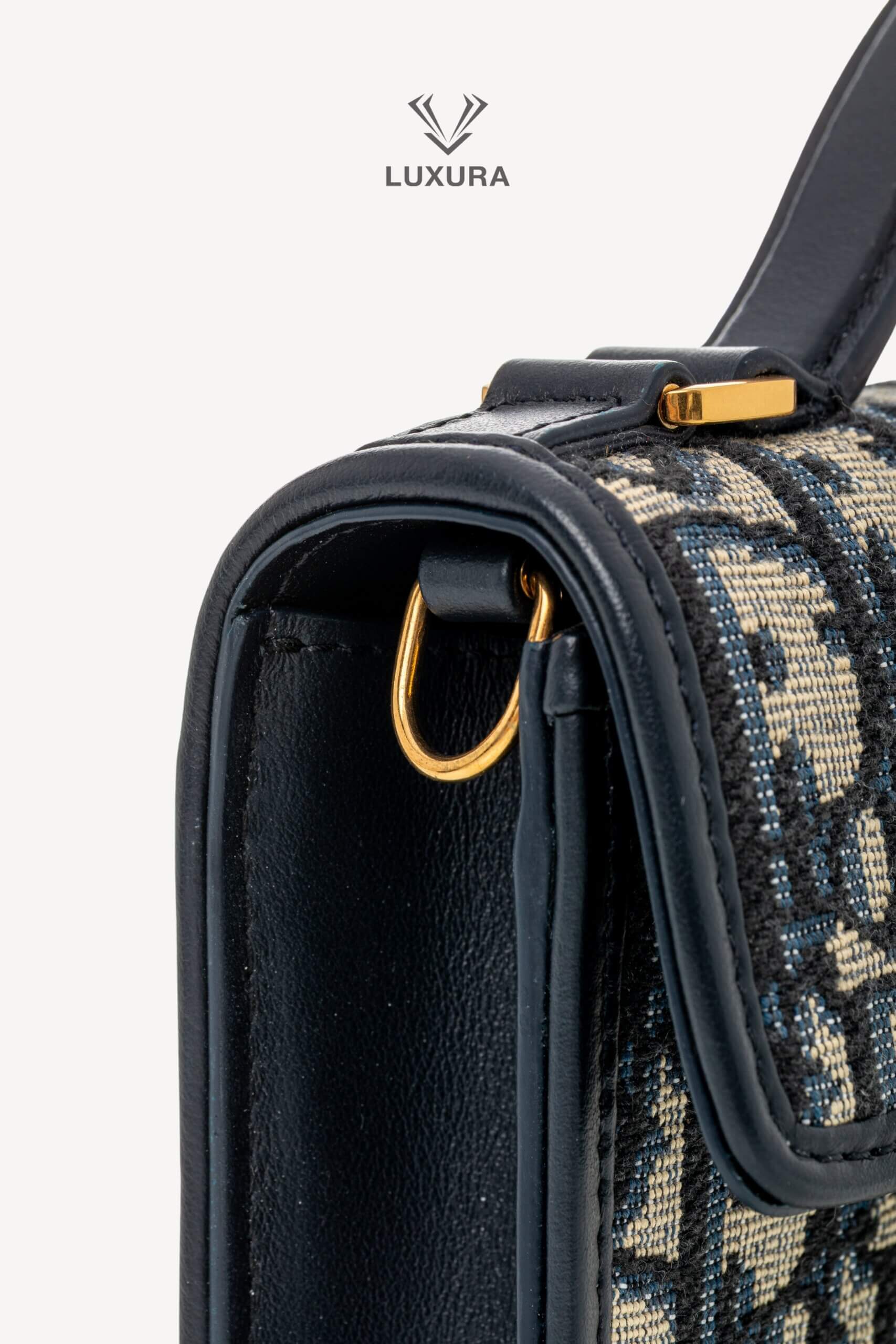 <span style="font-size: 10px;letter-spacing: .15em">HARD TO FIND</span><br>            <strong>CHRISTIAN DIOR</strong><br>            <div style="margin-top:10px;font-size:16px">Miss Montaigne Mini Bag Blue Dior Oblique Jacquard</div><br> - Image 22