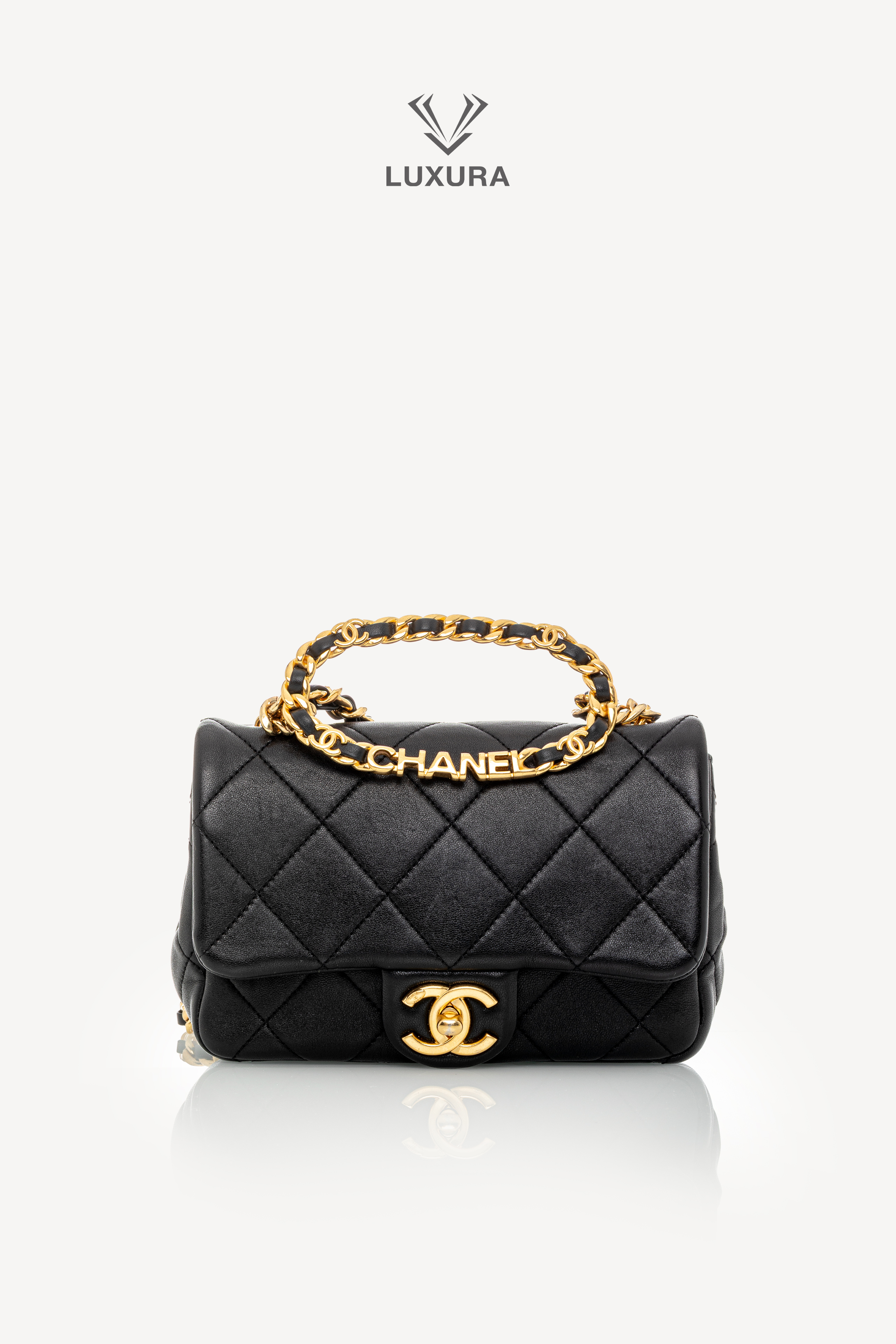 <span style="font-size: 10px;letter-spacing: .15em">HARD TO FIND</span><br>            <strong>CHANEL</strong><br>            <div style="margin-top:10px;font-size:16px">Mini Quilted Lambskin Round Top Handle Flap Bag Black</div><br> - Image 8
