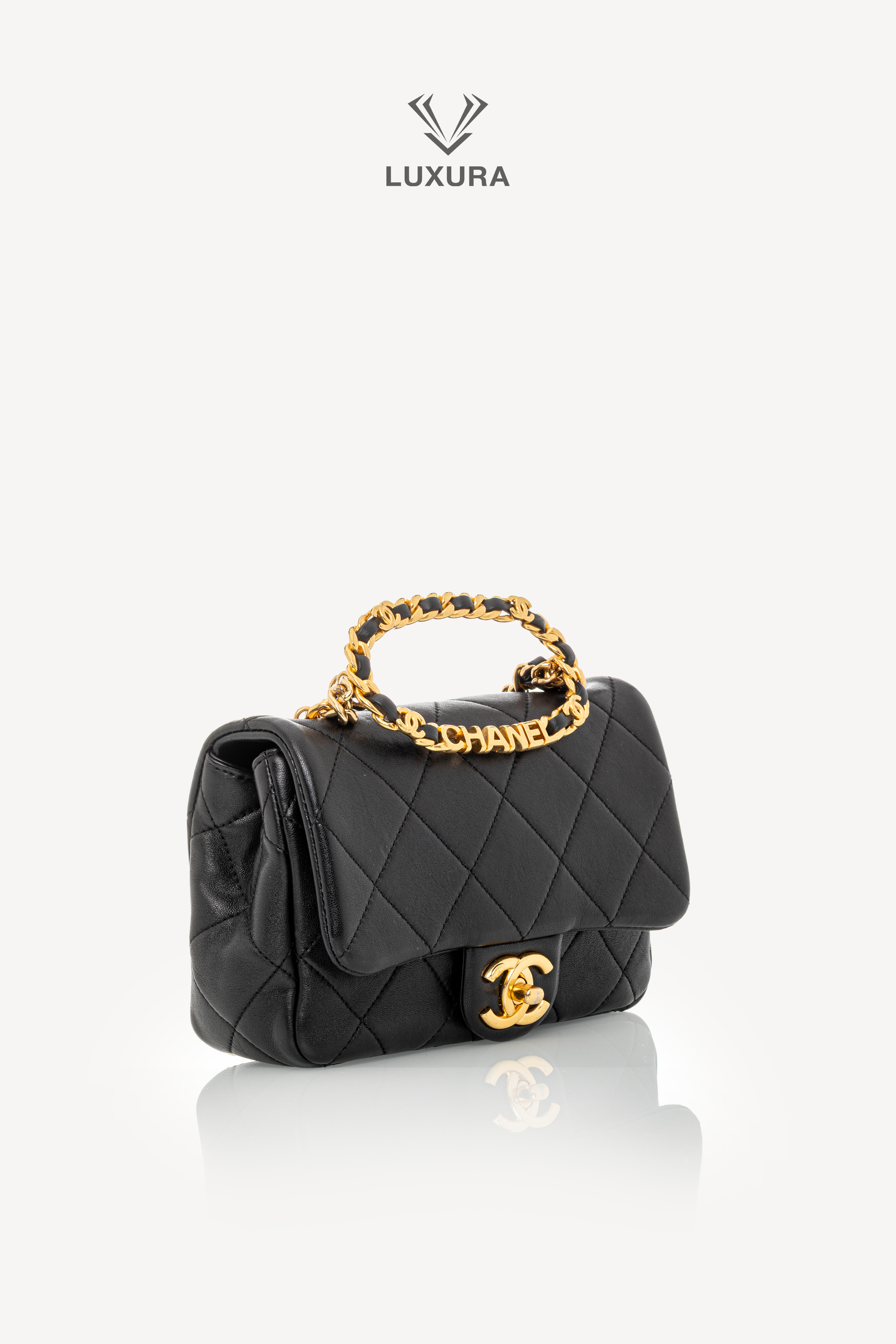 <span style="font-size: 10px;letter-spacing: .15em">HARD TO FIND</span><br>            <strong>CHANEL</strong><br>            <div style="margin-top:10px;font-size:16px">Mini Quilted Lambskin Round Top Handle Flap Bag Black</div><br> - Image 3
