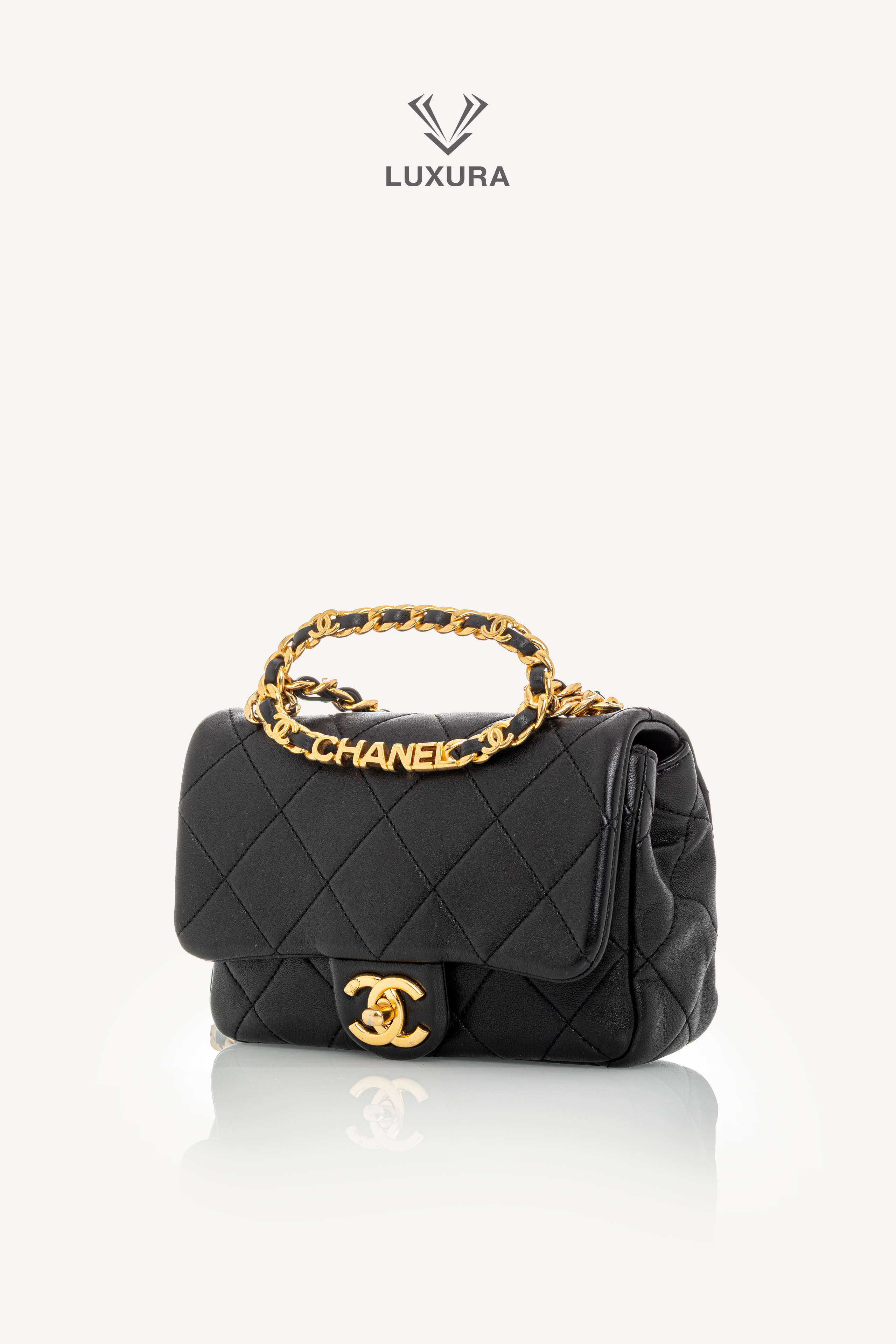 <span style="font-size: 10px;letter-spacing: .15em">HARD TO FIND</span><br>            <strong>CHANEL</strong><br>            <div style="margin-top:10px;font-size:16px">Mini Quilted Lambskin Round Top Handle Flap Bag Black</div><br> - Image 11