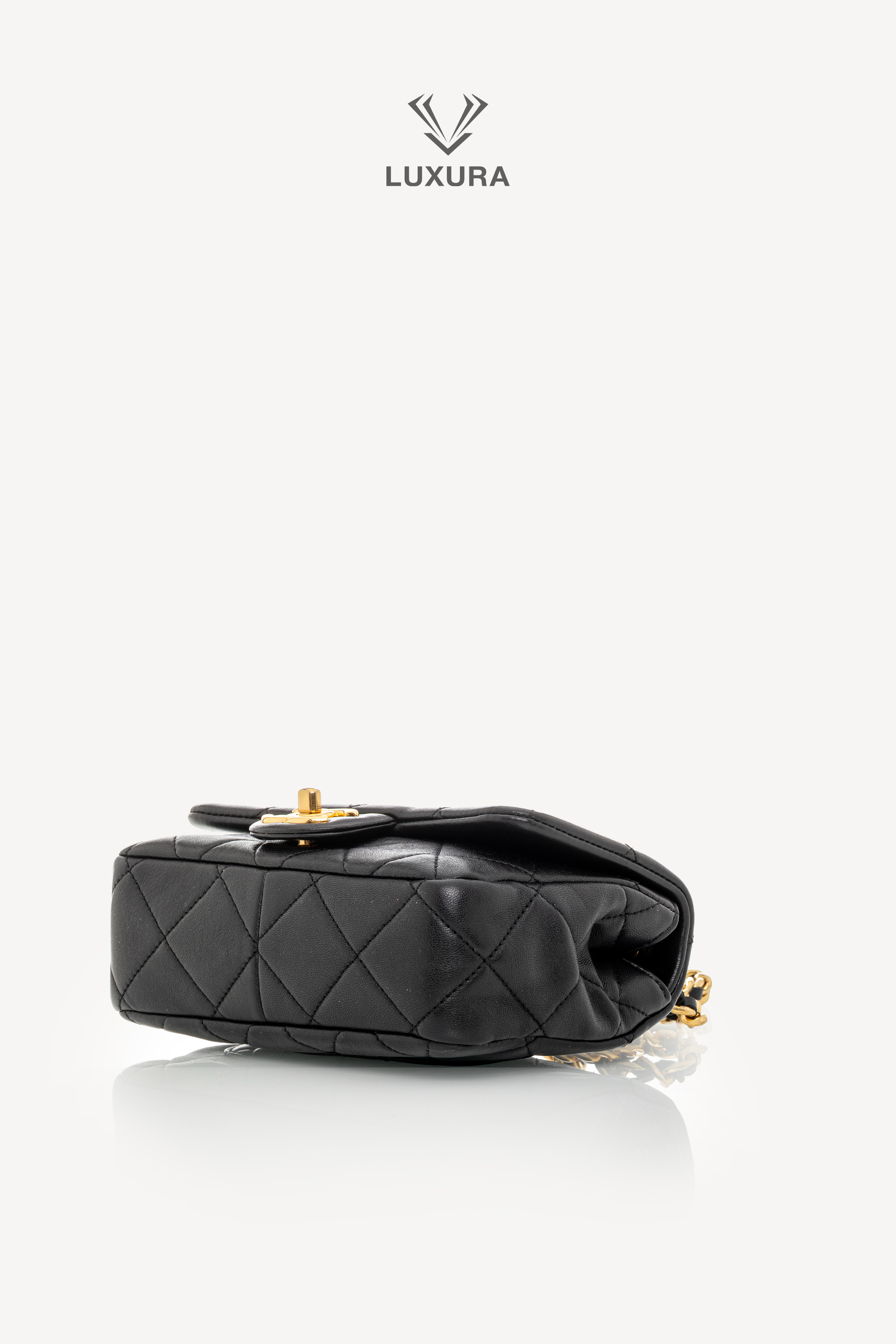 <span style="font-size: 10px;letter-spacing: .15em">HARD TO FIND</span><br>            <strong>CHANEL</strong><br>            <div style="margin-top:10px;font-size:16px">Mini Quilted Lambskin Round Top Handle Flap Bag Black</div><br> - Image 30