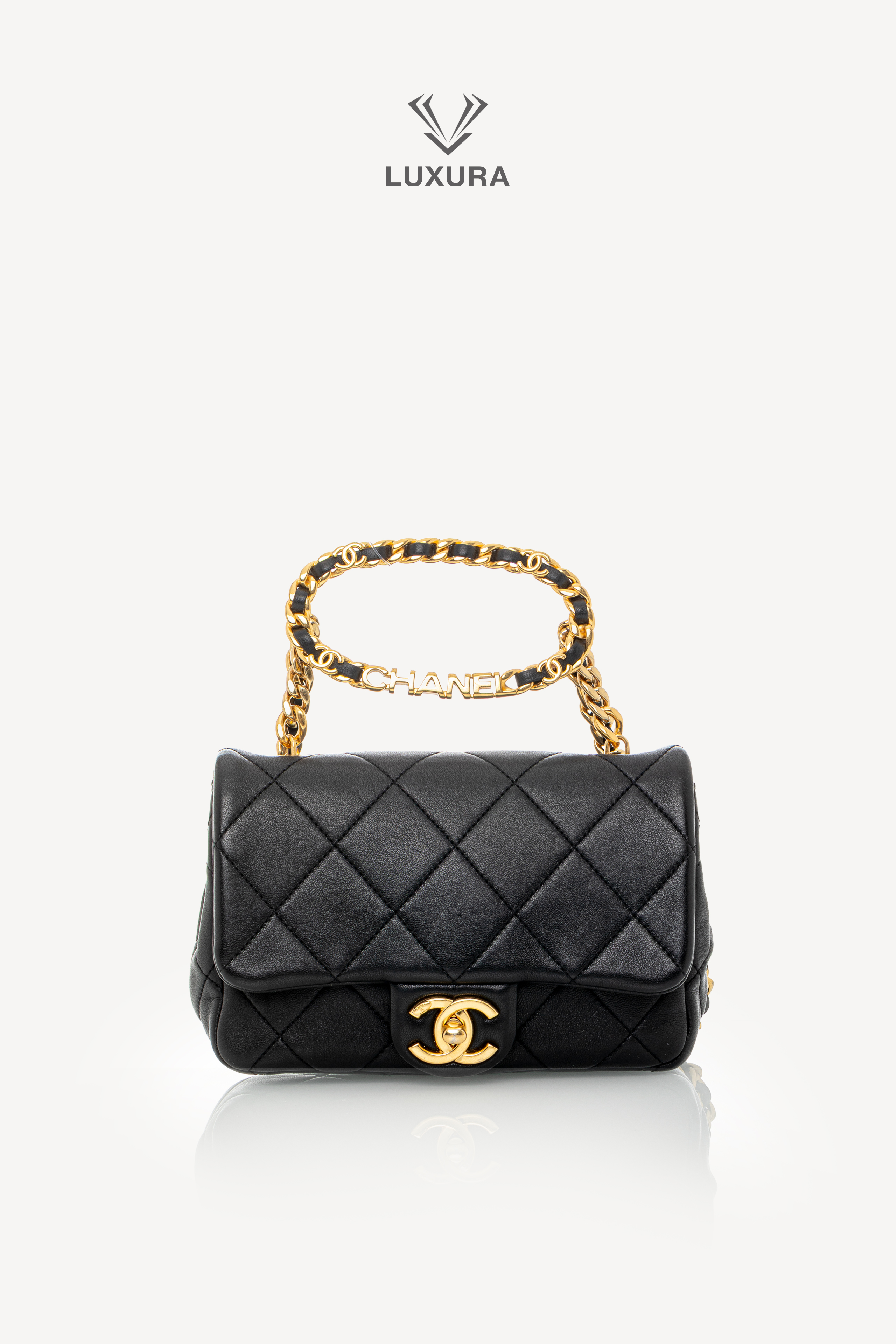 <span style="font-size: 10px;letter-spacing: .15em">HARD TO FIND</span><br>            <strong>CHANEL</strong><br>            <div style="margin-top:10px;font-size:16px">Mini Quilted Lambskin Round Top Handle Flap Bag Black</div><br> - Image 7