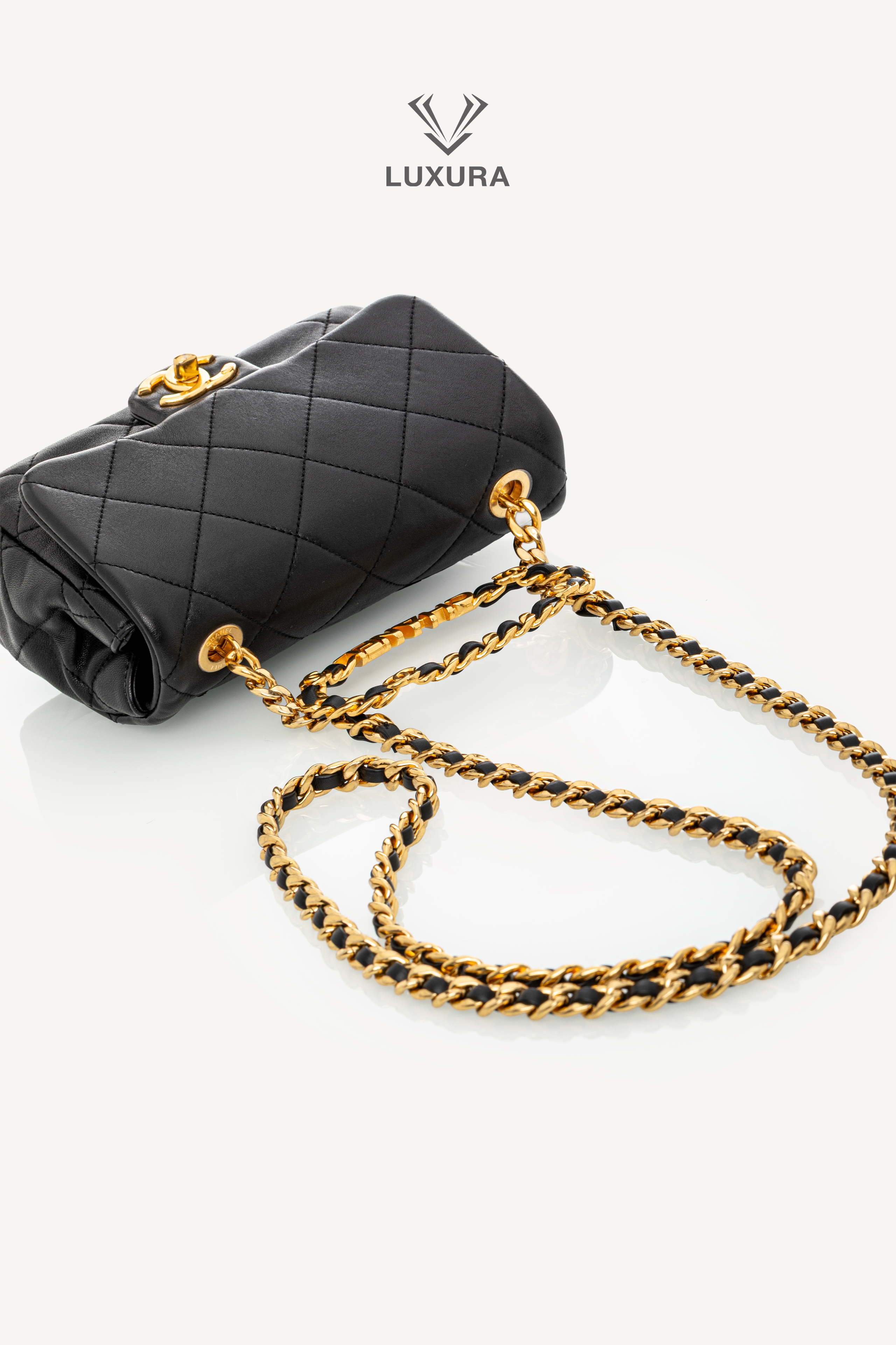 <span style="font-size: 10px;letter-spacing: .15em">HARD TO FIND</span><br>            <strong>CHANEL</strong><br>            <div style="margin-top:10px;font-size:16px">Mini Quilted Lambskin Round Top Handle Flap Bag Black</div><br> - Image 5