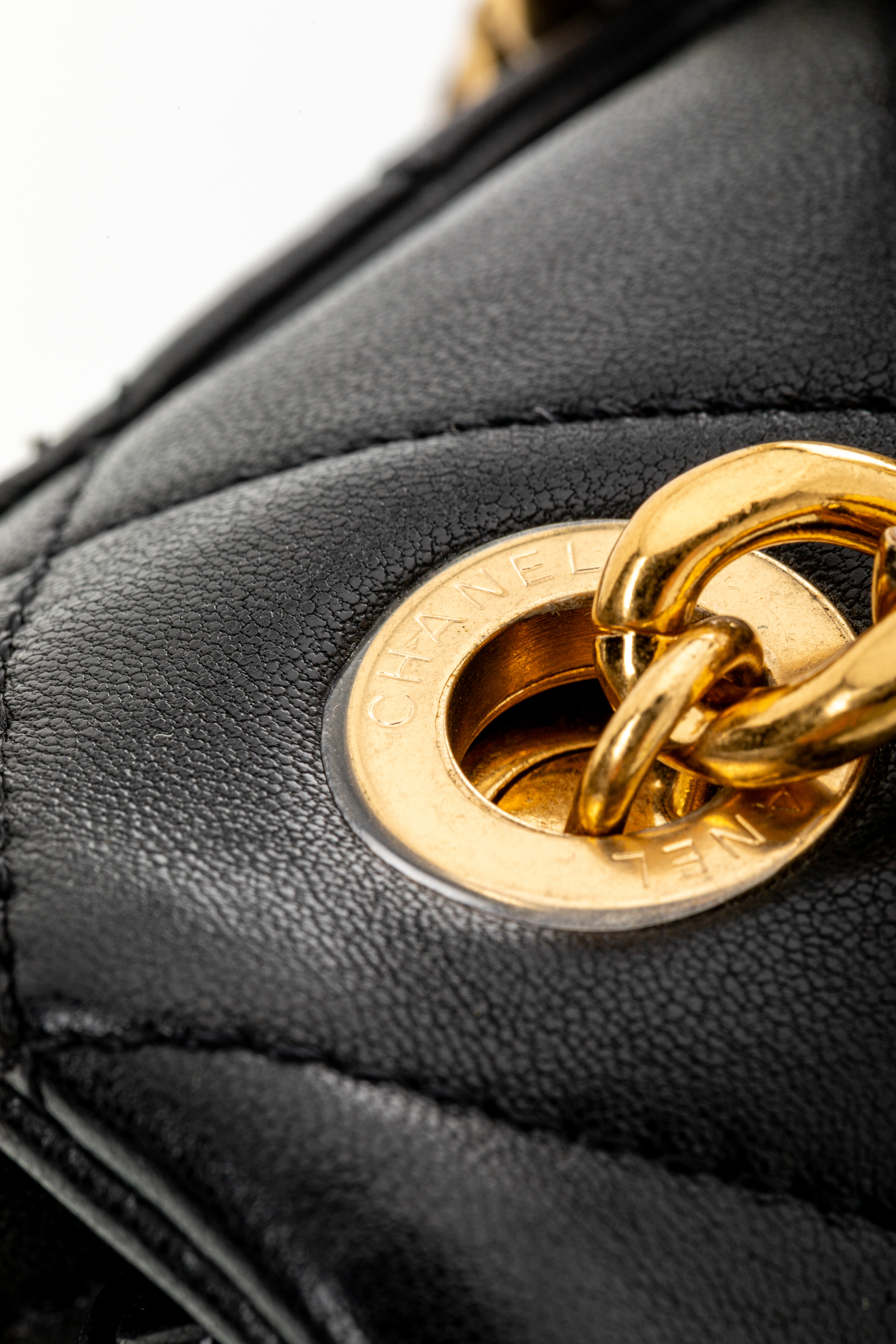<span style="font-size: 10px;letter-spacing: .15em">HARD TO FIND</span><br>            <strong>CHANEL</strong><br>            <div style="margin-top:10px;font-size:16px">Mini Quilted Lambskin Round Top Handle Flap Bag Black</div><br> - Image 20