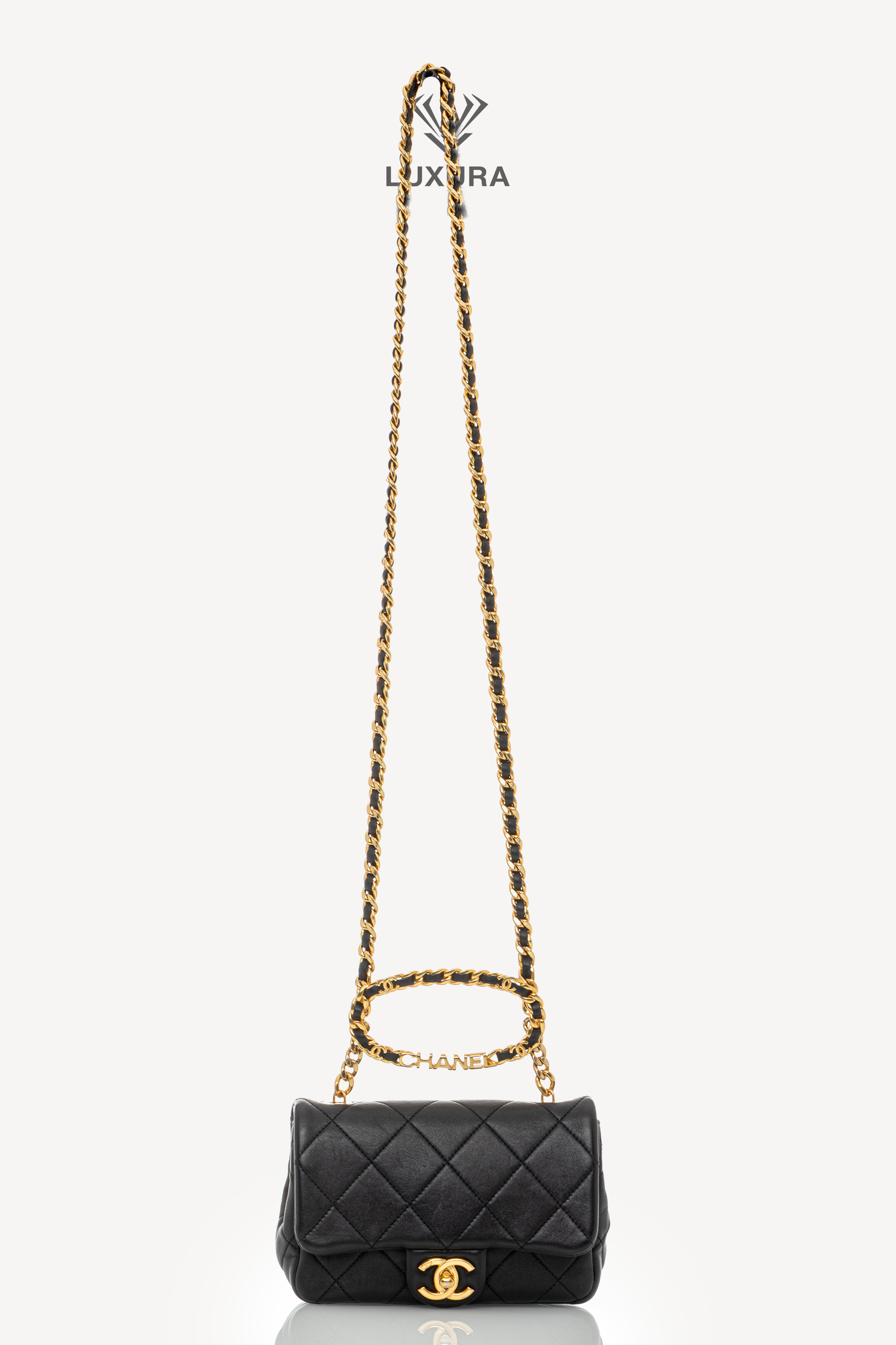 <span style="font-size: 10px;letter-spacing: .15em">HARD TO FIND</span><br>            <strong>CHANEL</strong><br>            <div style="margin-top:10px;font-size:16px">Mini Quilted Lambskin Round Top Handle Flap Bag Black</div><br> - Image 6