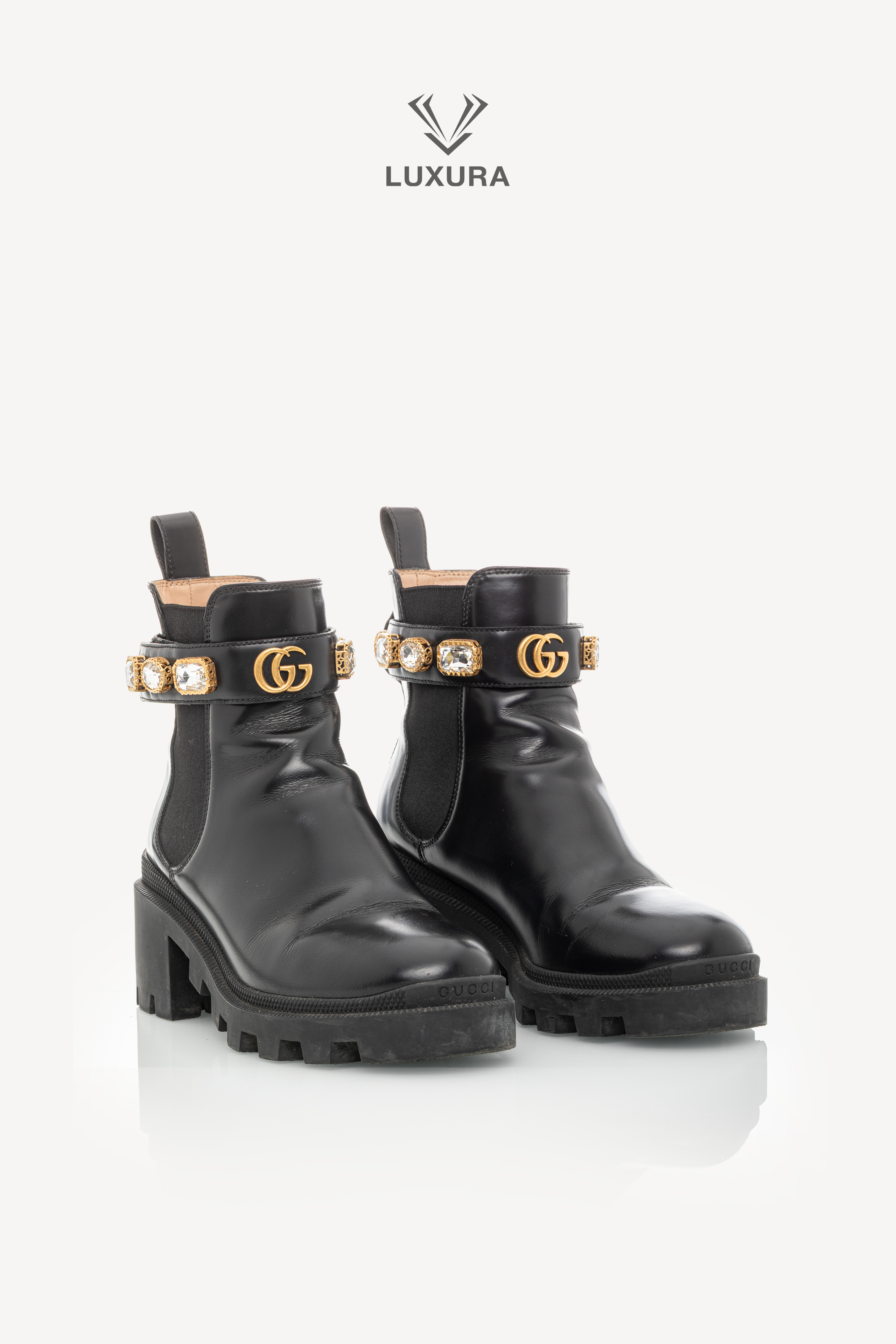 <span style="font-size: 10px;letter-spacing: .15em">BEST DEAL</span><br> <strong>GUCCI</strong><br> <div style="margin-top:10px;font-size:16px">Calfskin Crystal GG Trip Chelsea Ankle Boots Black 36</div><br> - Image 5