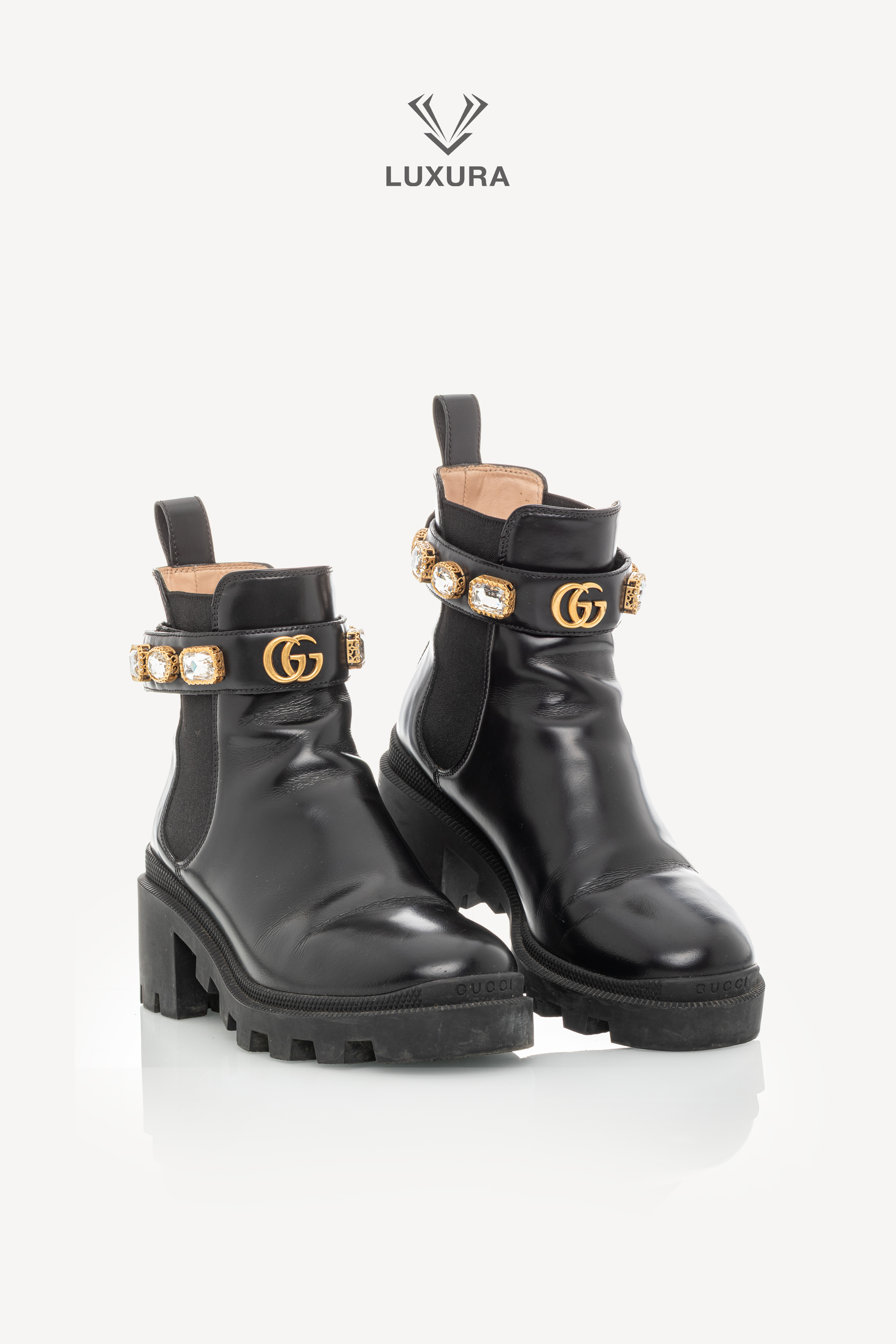 <span style="font-size: 10px;letter-spacing: .15em">BEST DEAL</span><br> <strong>GUCCI</strong><br> <div style="margin-top:10px;font-size:16px">Calfskin Crystal GG Trip Chelsea Ankle Boots Black 36</div><br> - Image 3