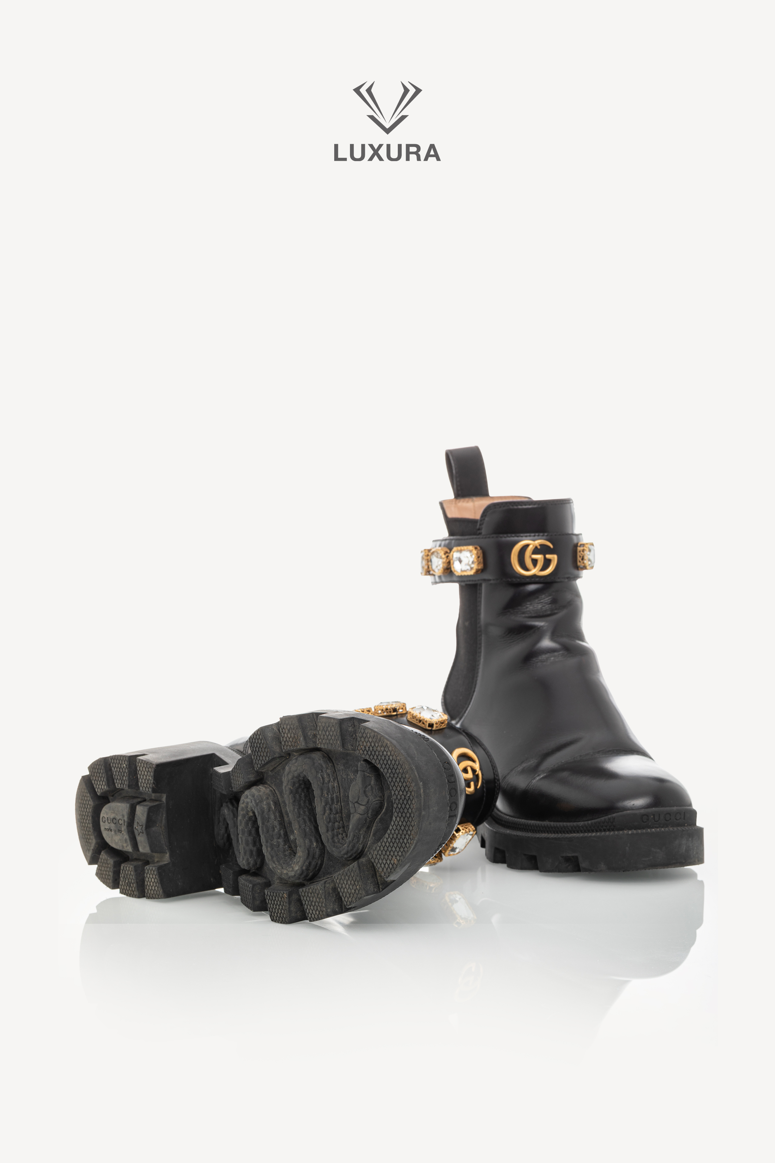 <span style="font-size: 10px;letter-spacing: .15em">BEST DEAL</span><br> <strong>GUCCI</strong><br> <div style="margin-top:10px;font-size:16px">Calfskin Crystal GG Trip Chelsea Ankle Boots Black 36</div><br> - Image 19