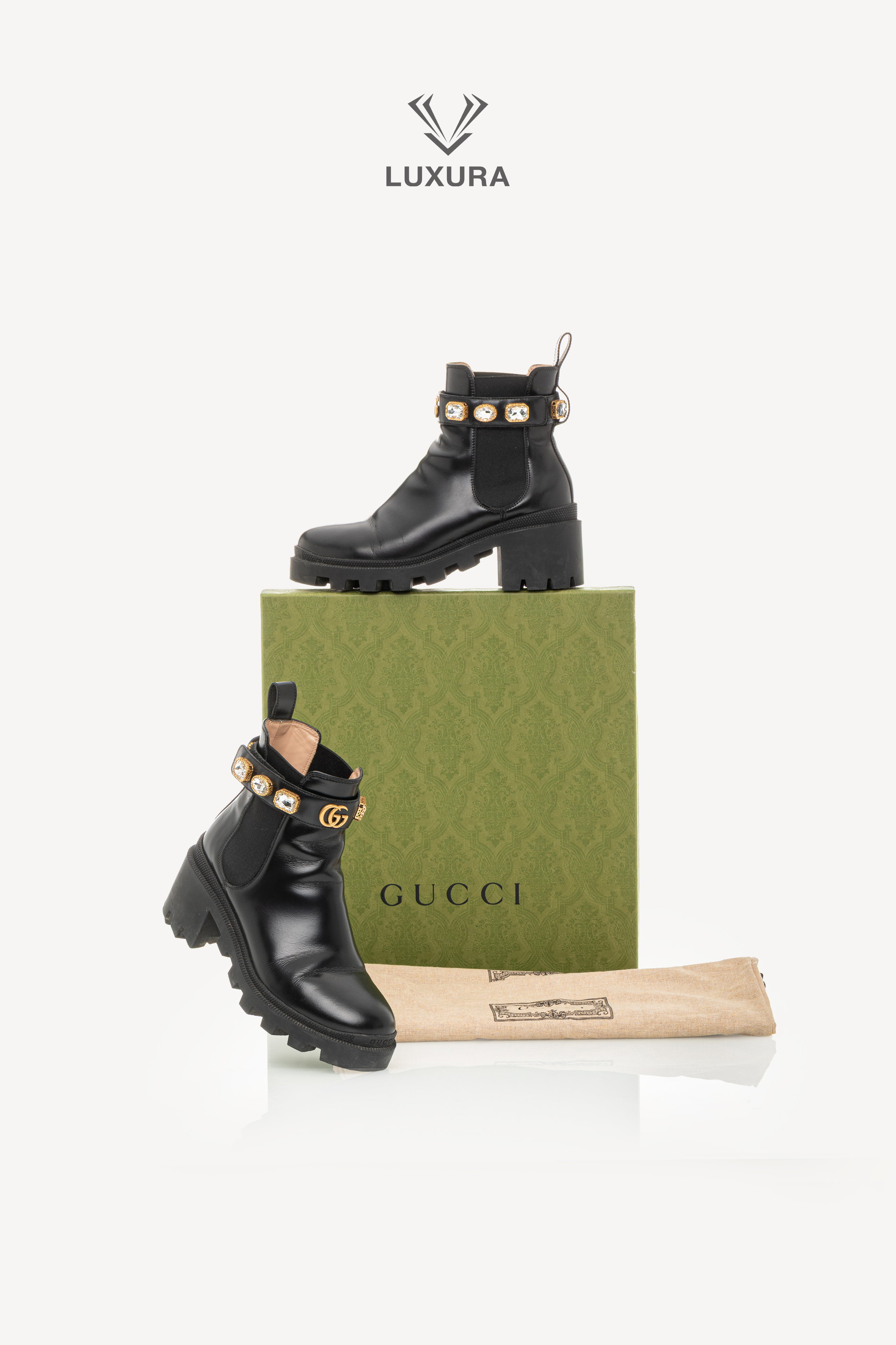 <span style="font-size: 10px;letter-spacing: .15em">BEST DEAL</span><br> <strong>GUCCI</strong><br> <div style="margin-top:10px;font-size:16px">Calfskin Crystal GG Trip Chelsea Ankle Boots Black 36</div><br> - Image 2