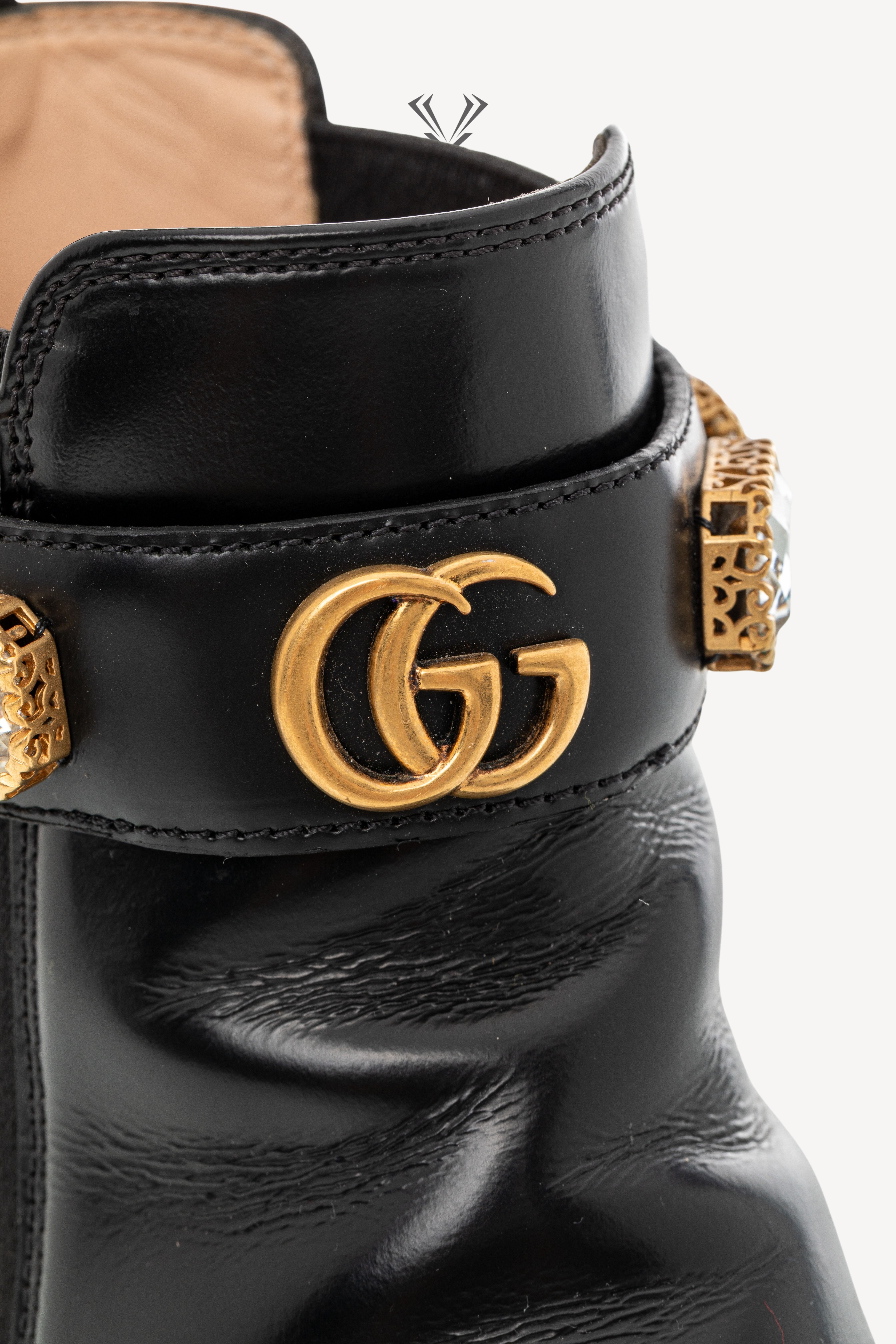 <span style="font-size: 10px;letter-spacing: .15em">BEST DEAL</span><br> <strong>GUCCI</strong><br> <div style="margin-top:10px;font-size:16px">Calfskin Crystal GG Trip Chelsea Ankle Boots Black 36</div><br> - Image 13