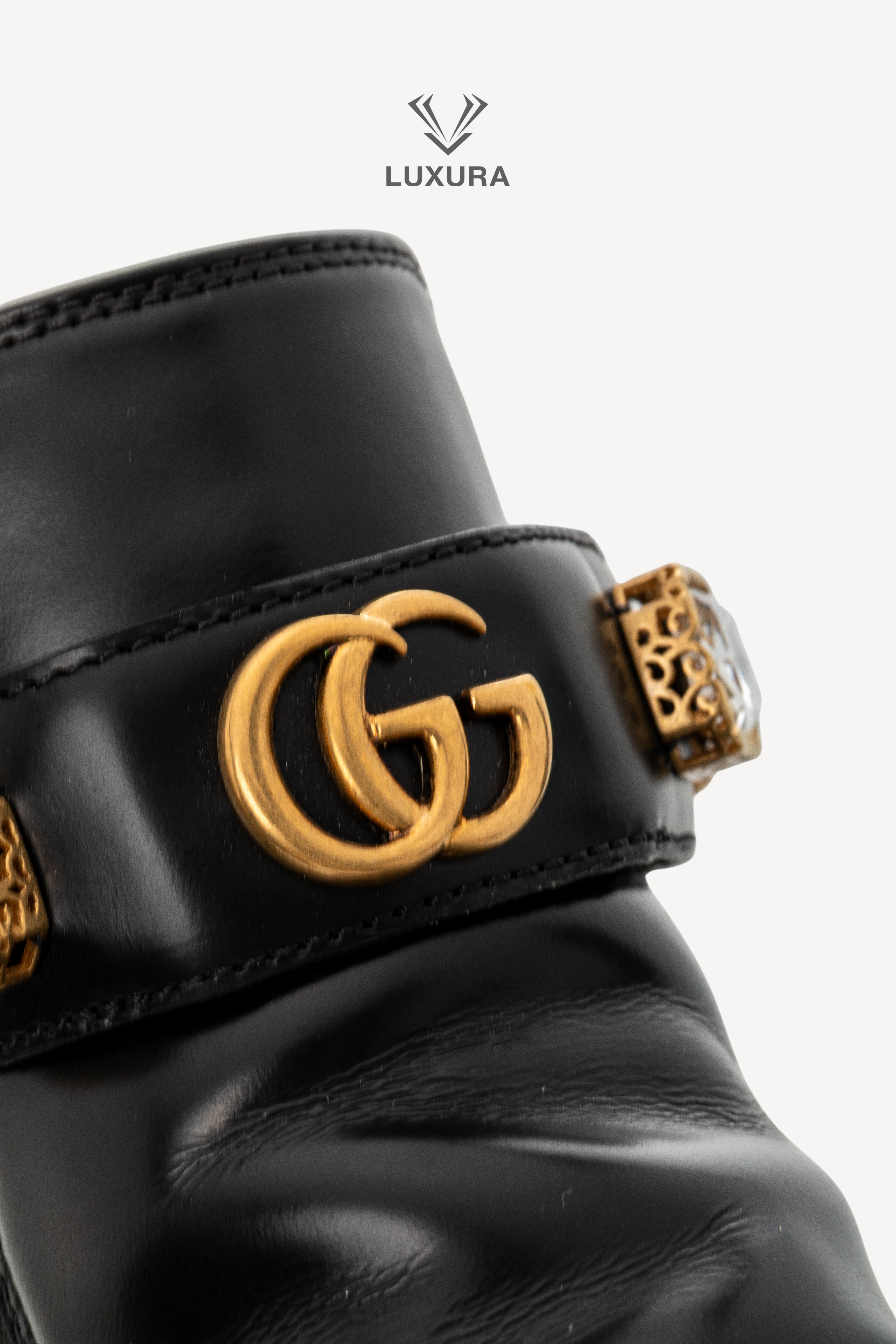 <span style="font-size: 10px;letter-spacing: .15em">BEST DEAL</span><br> <strong>GUCCI</strong><br> <div style="margin-top:10px;font-size:16px">Calfskin Crystal GG Trip Chelsea Ankle Boots Black 36</div><br> - Image 11