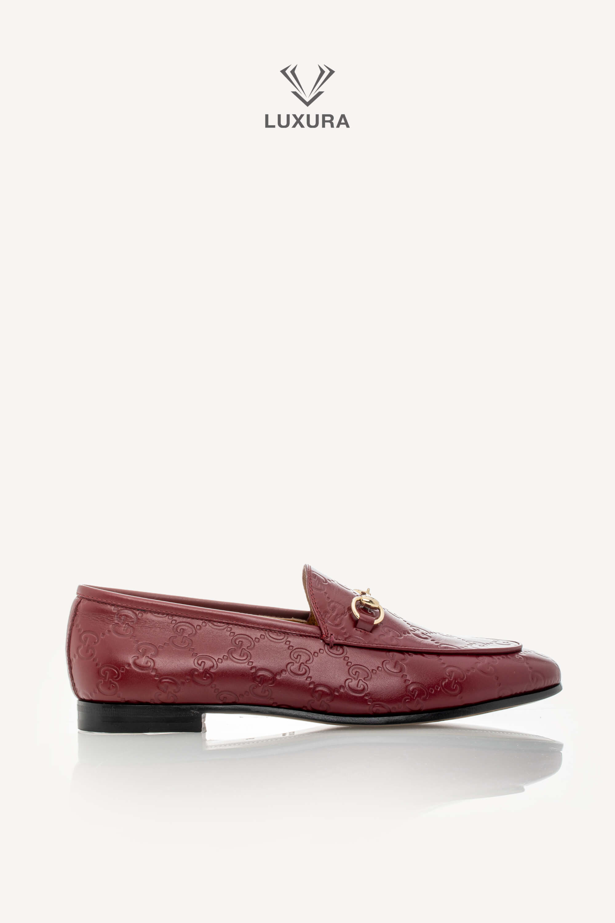 <span style="font-size: 10px;letter-spacing: .15em">BEST DEAL</span><br> <strong>GUCCI</strong><br> <div style="margin-top:10px;font-size:16px">Guccissima Jordaan Loafers Red 39</div><br>