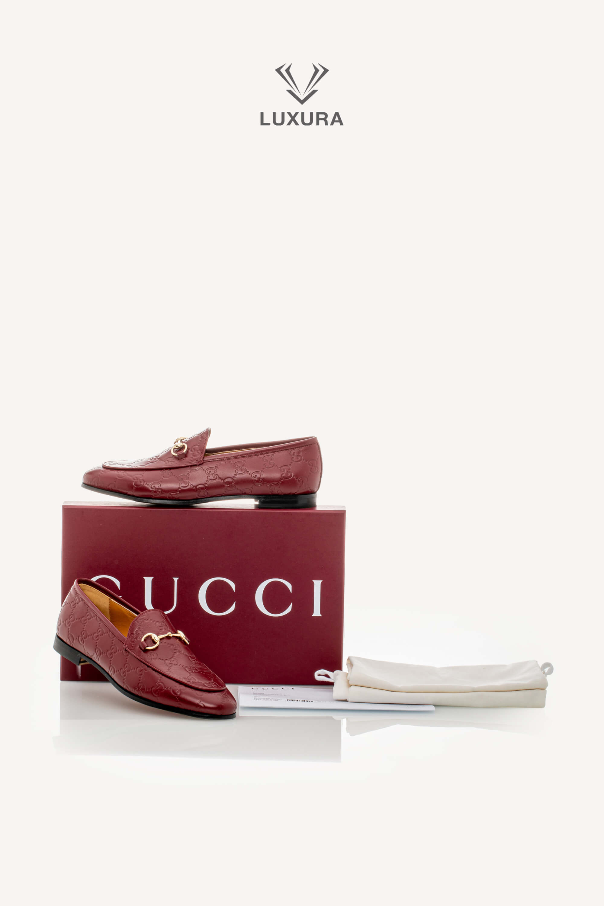 <span style="font-size: 10px;letter-spacing: .15em">BEST DEAL</span><br> <strong>GUCCI</strong><br> <div style="margin-top:10px;font-size:16px">Guccissima Jordaan Loafers Red 39</div><br> - Image 2