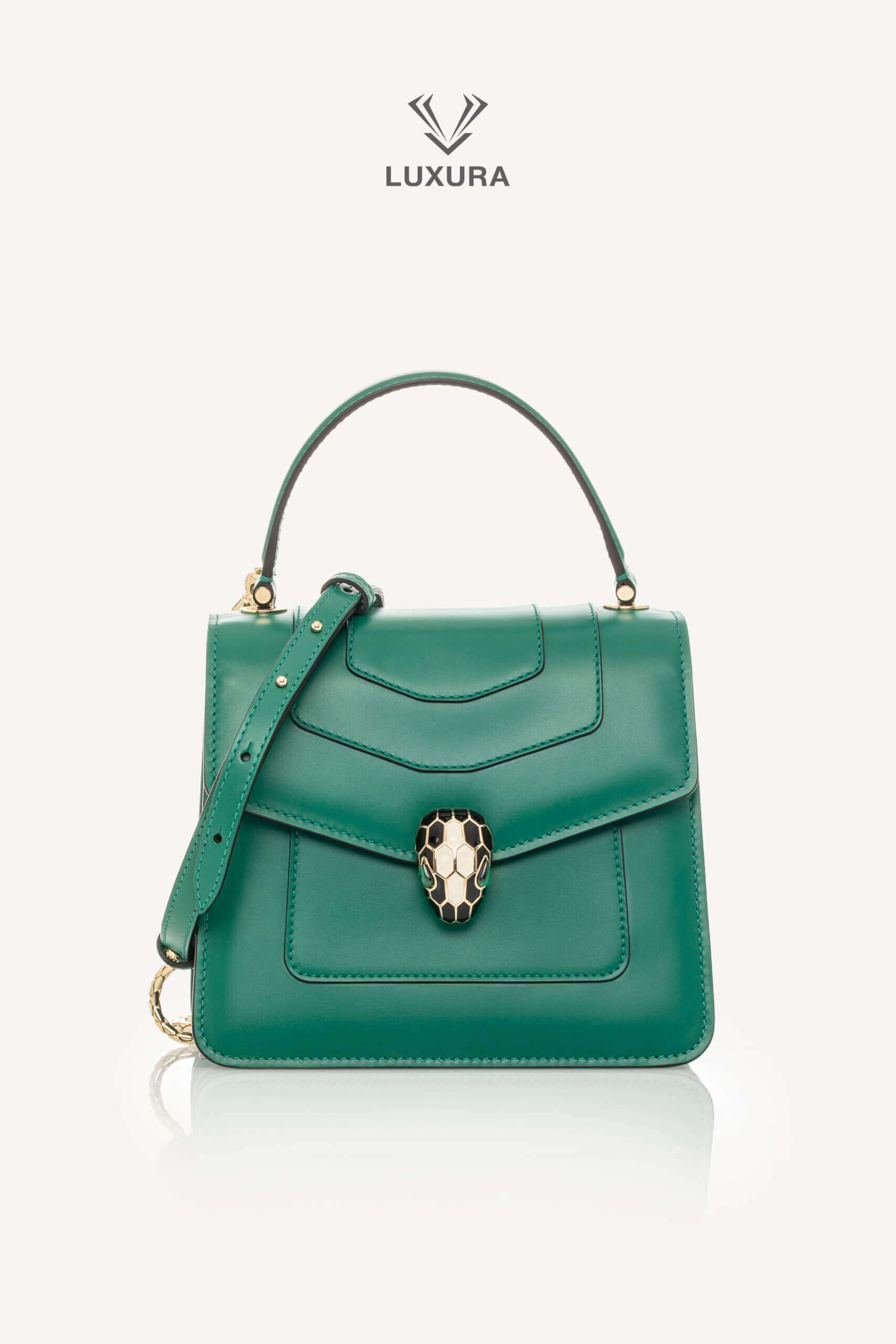 <span style="font-size: 10px;letter-spacing: .15em"></span><br> <strong>BVLGARI</strong><br> <div style="margin-top:10px;font-size:16px">Calfskin Serpenti Forever Top Handle Bag Emerald Green</div><br>