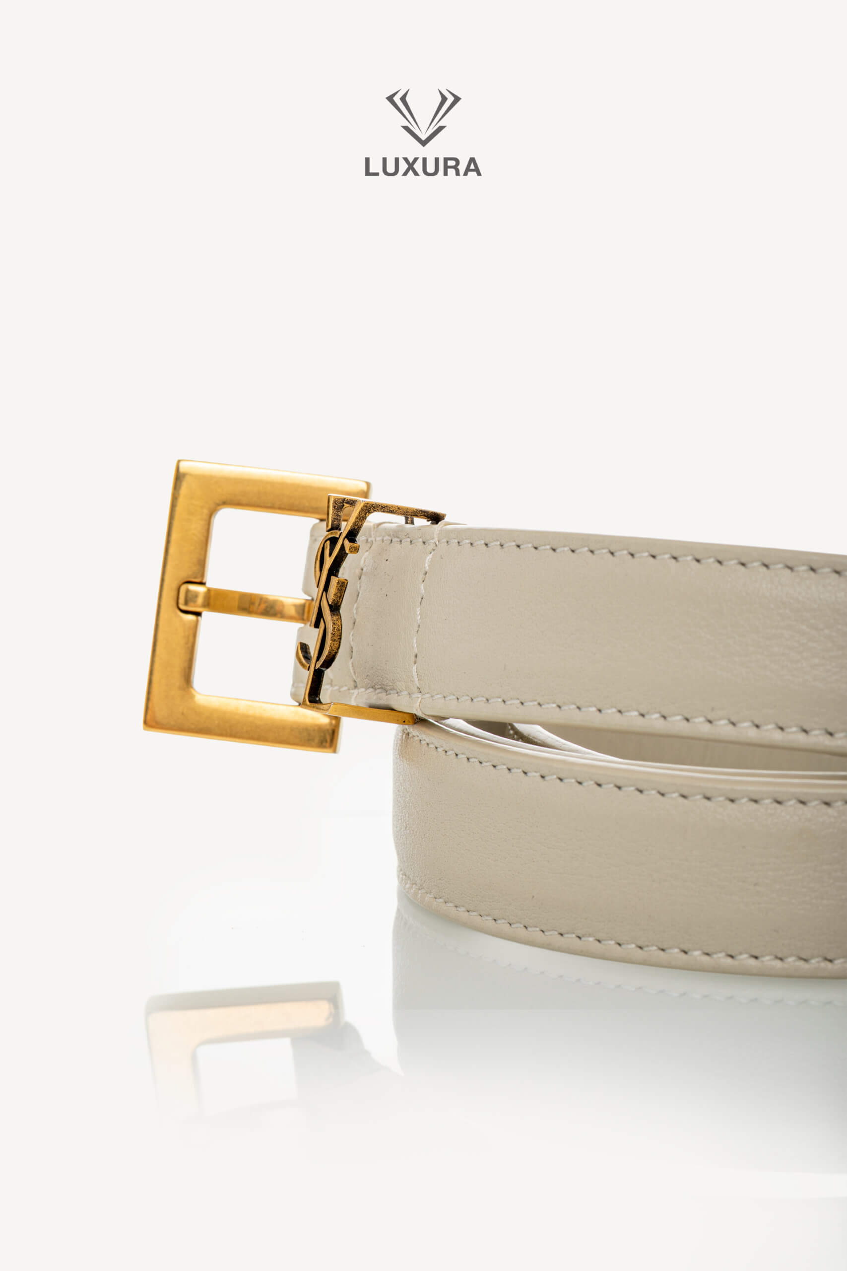 <span style="font-size: 10px;letter-spacing: .15em">BEST DEAL</span><br>            <strong>SAINT LAURENT</strong><br>            <div style="margin-top:10px;font-size:16px">Cassandre Thin `Belt in Smooth Leather Crema Soft 75</div><br> - Image 7